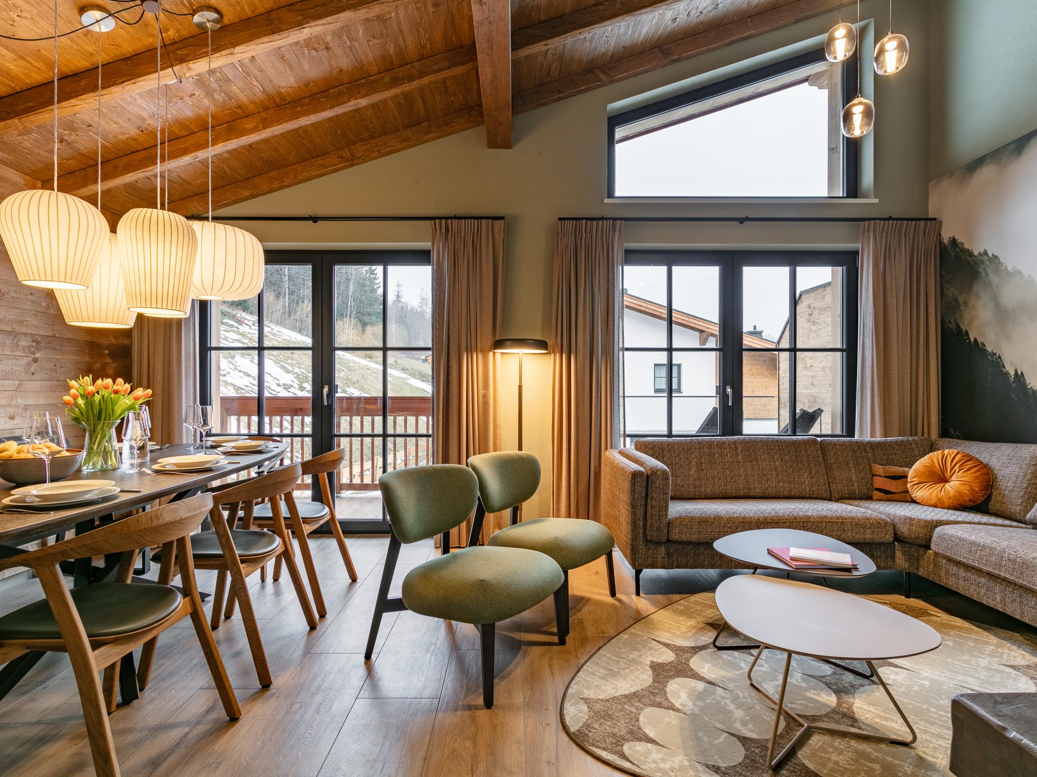 Bedroom with comfortable beds at Tauernlodge Eben C4 in Eben im Pongau