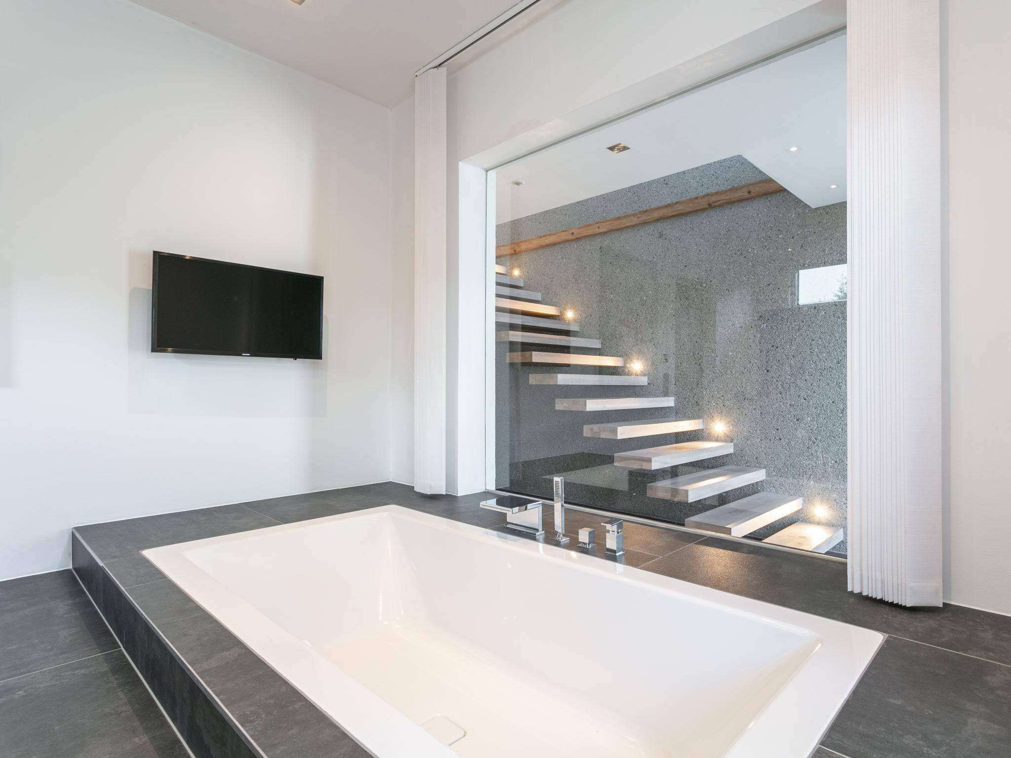 Modern kitchen at Alpin Chalet ARTE in Söll