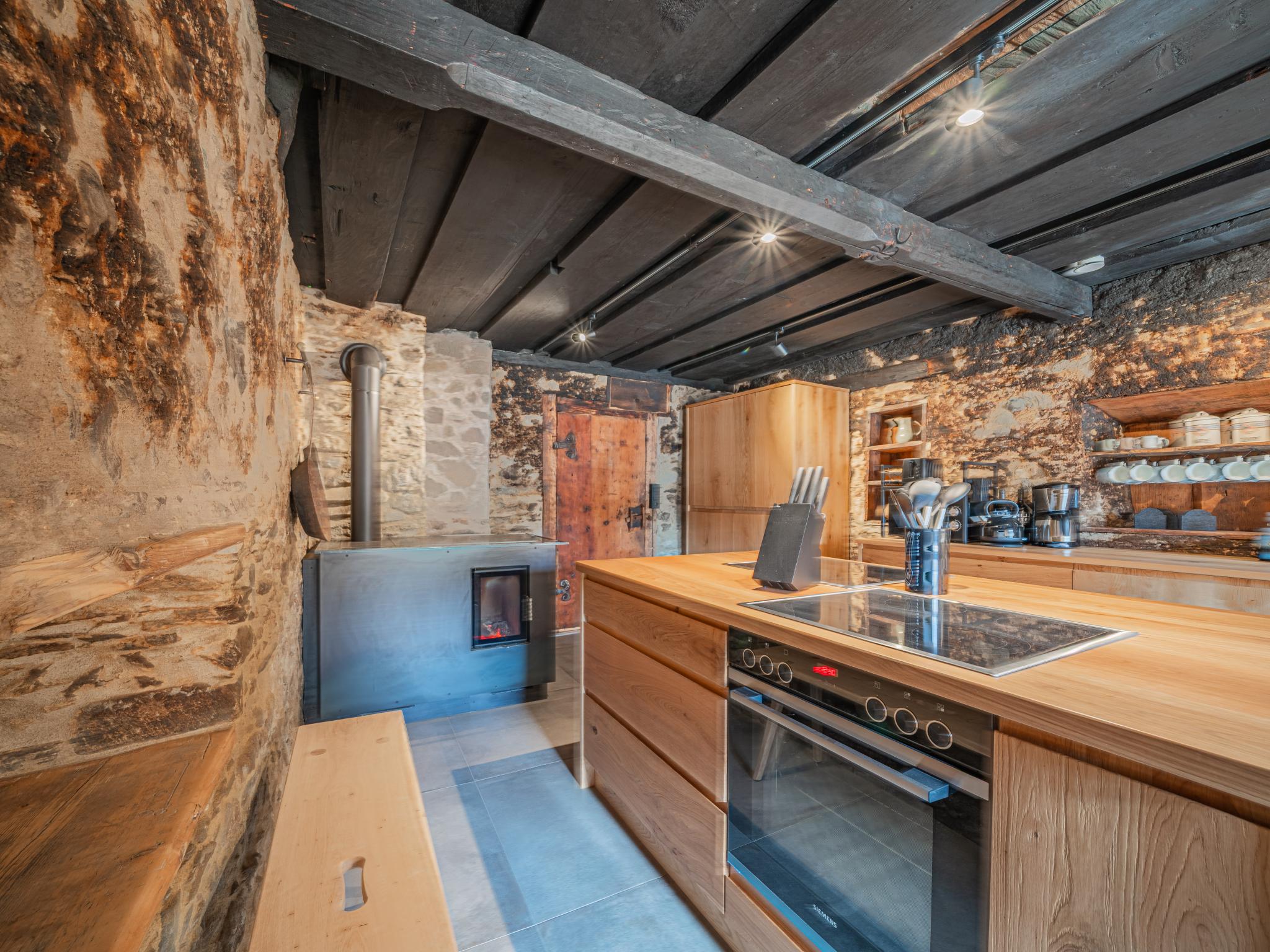 Bedroom with comfortable beds at Raneburg 4 in Matrei in Osttirol