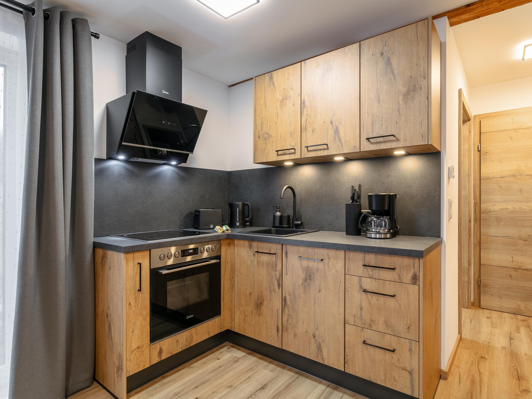 Bedroom with comfortable beds at Tennerhof Apartments Top 1 in Brixen im Thale