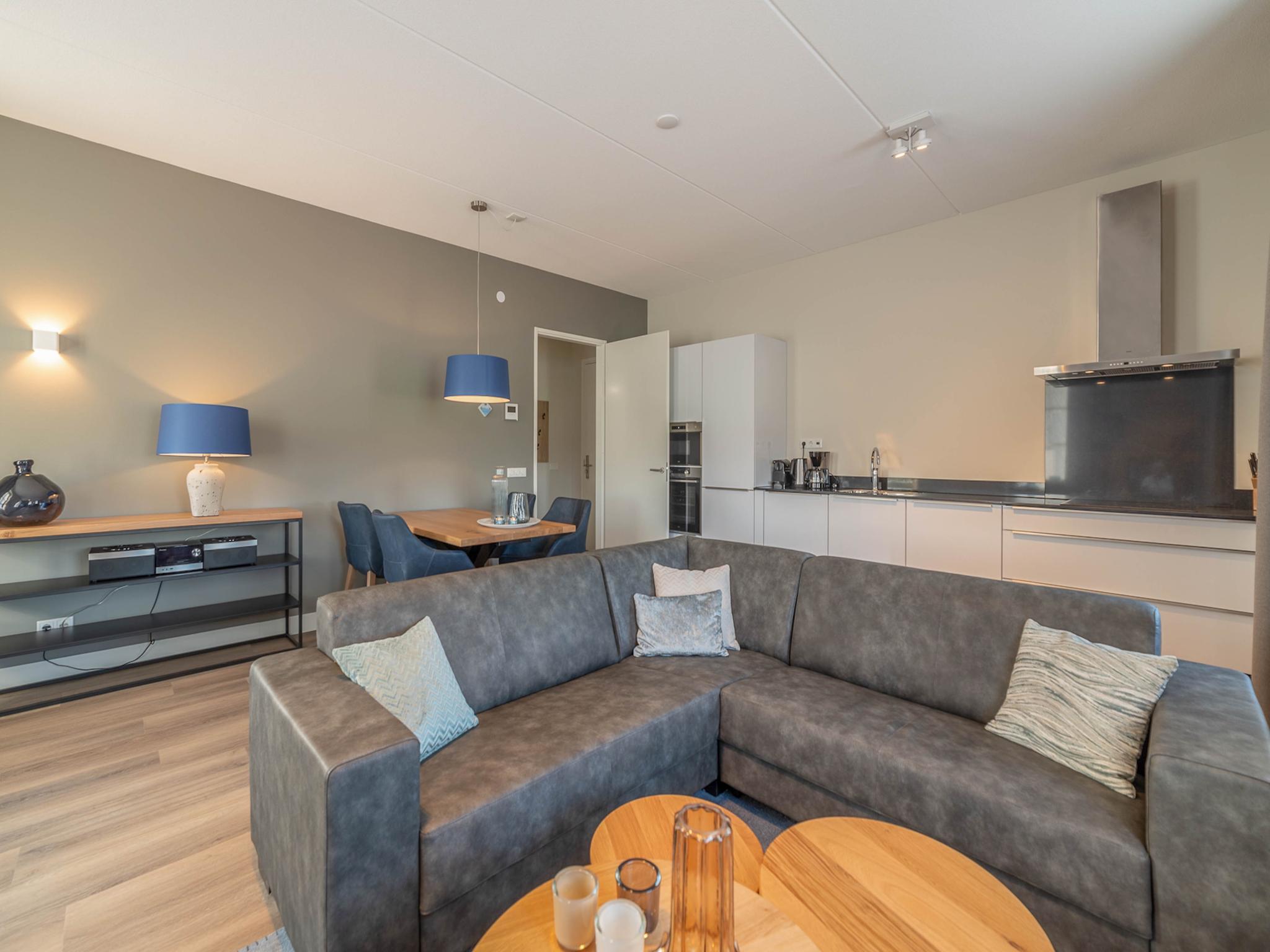 Bedroom with comfortable beds at SeaLuxe Suite 27D in Colijnsplaat