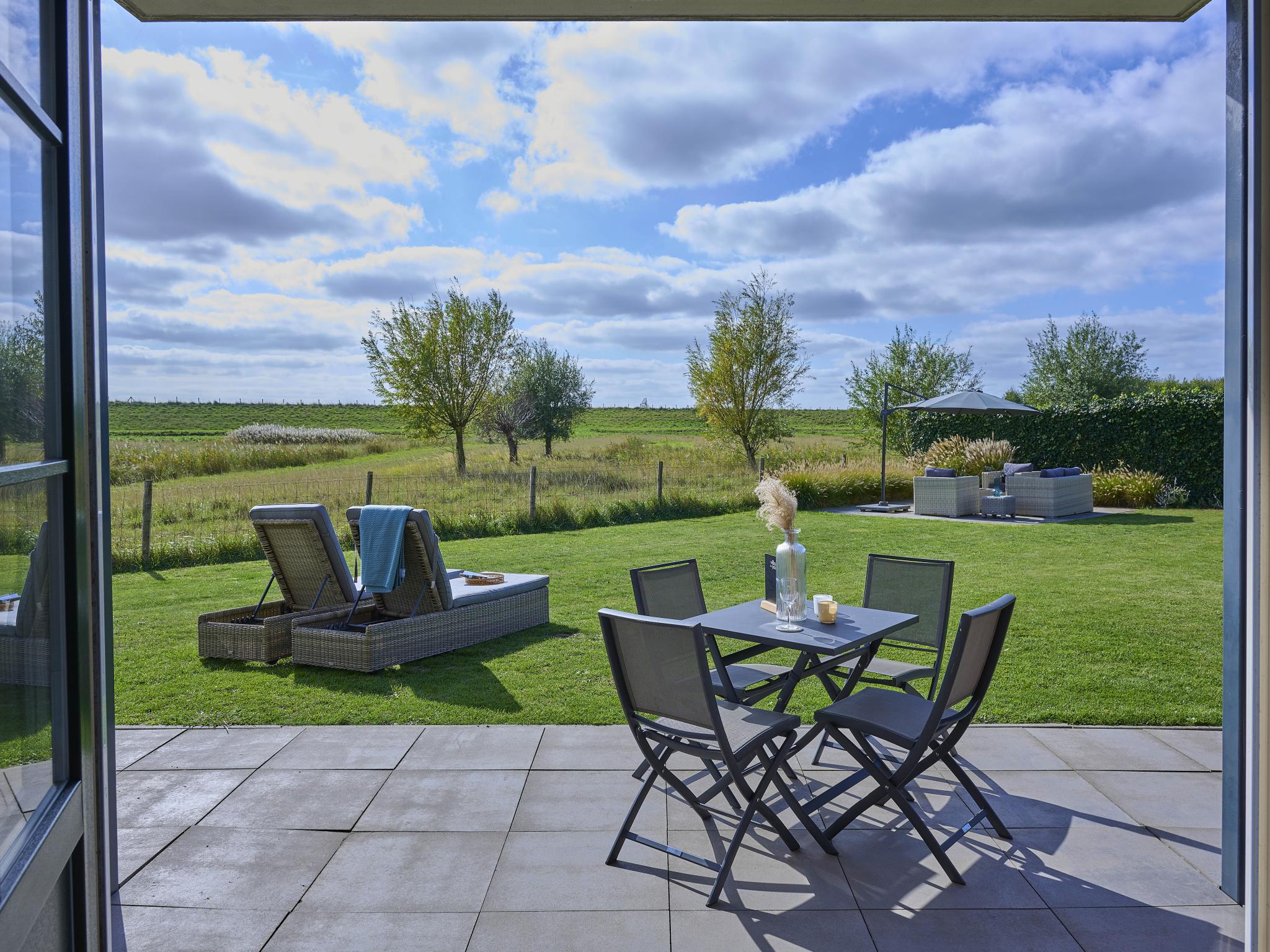 Bedroom with comfortable beds at SeaLuxe Residence 27C in Colijnsplaat