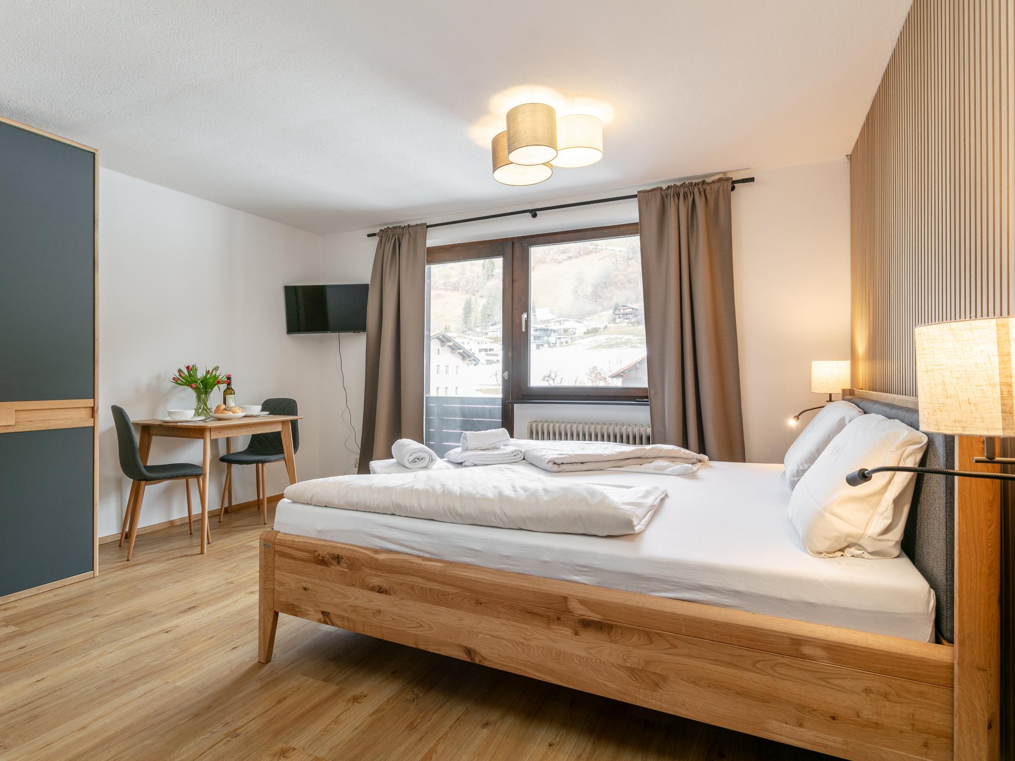 Bedroom with comfortable beds at Brixen Alpin Living Top 18 in Brixen