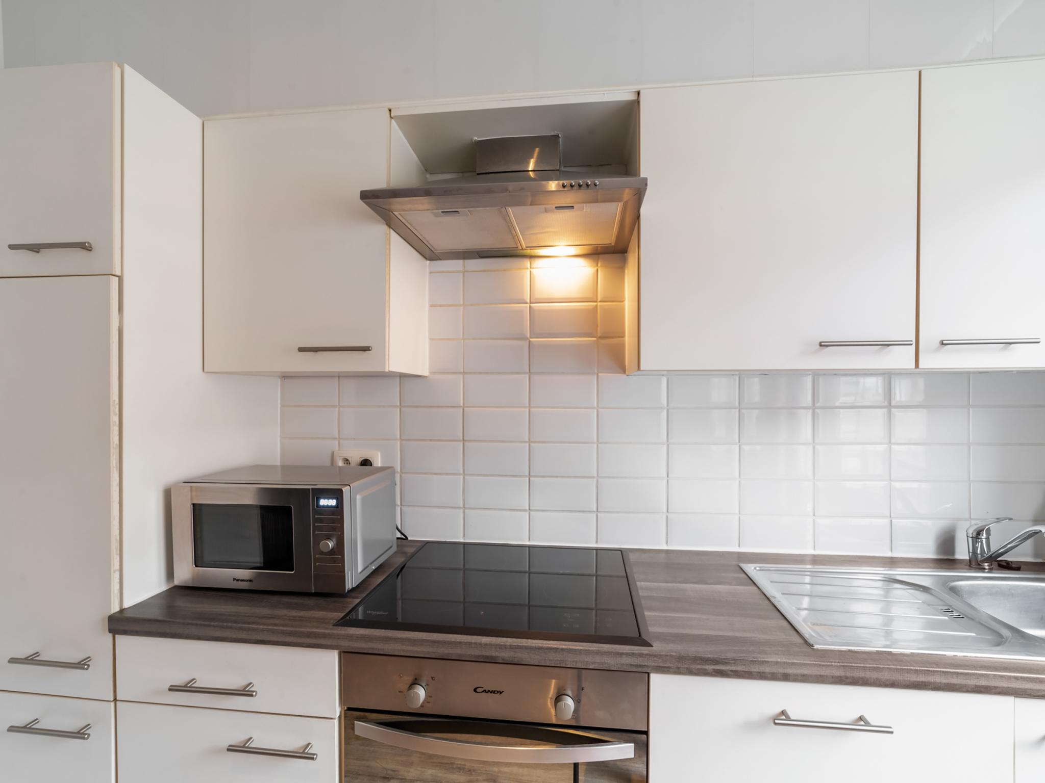 Modern kitchen at Ijzerstraat 52 - Vakantiewoning 52 in Blankenberge