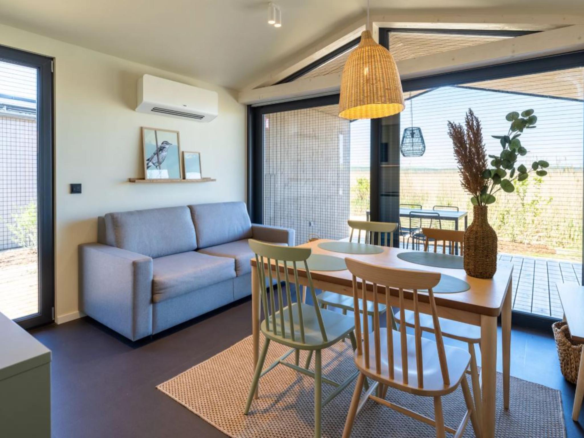 Bedroom with comfortable beds at Guesthouse Leithagebirge in Breitenbrunn (AT)