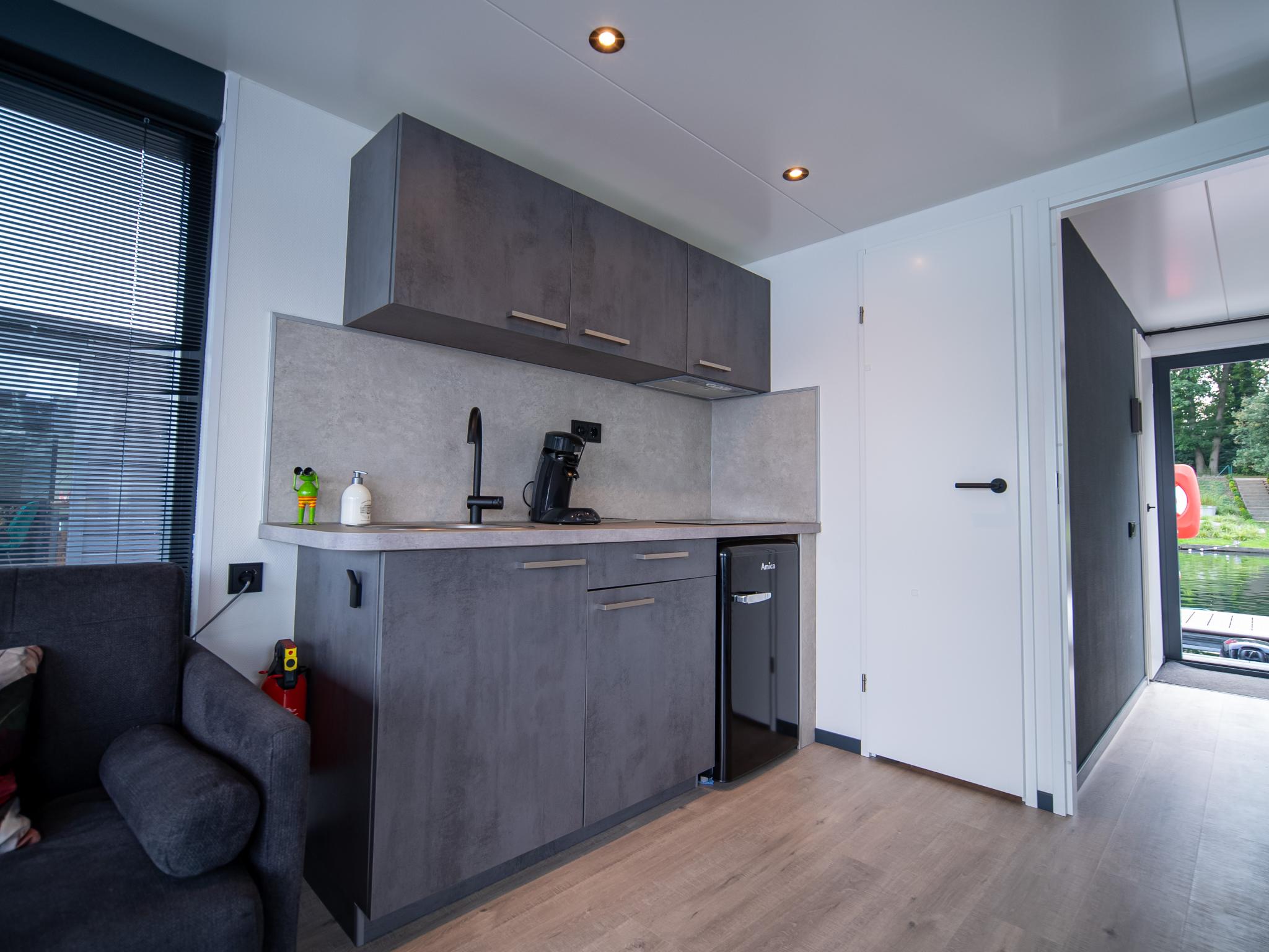 Modern kitchen at Floating in Limburg - rooftop hottub in Middelaar