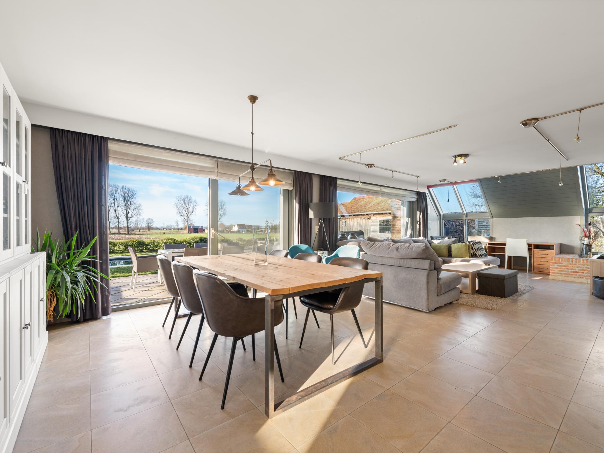 Bedroom with comfortable beds at Maison Odille in Sint Laureins
