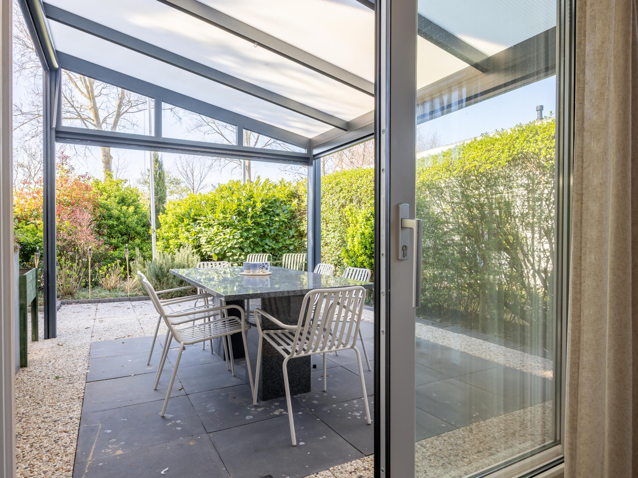 Outdoor terrace and views at Meerhuis Cardium in Kamperland