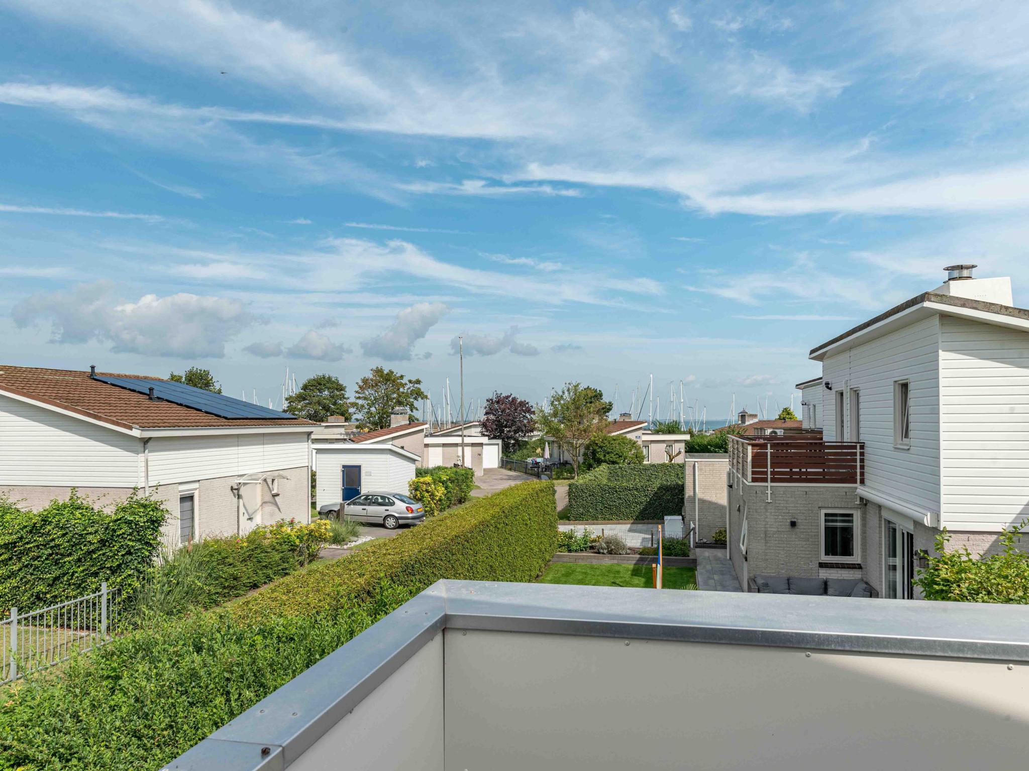 Outdoor terrace and views at Zeeuwse Wellness Lodge in Kamperland
