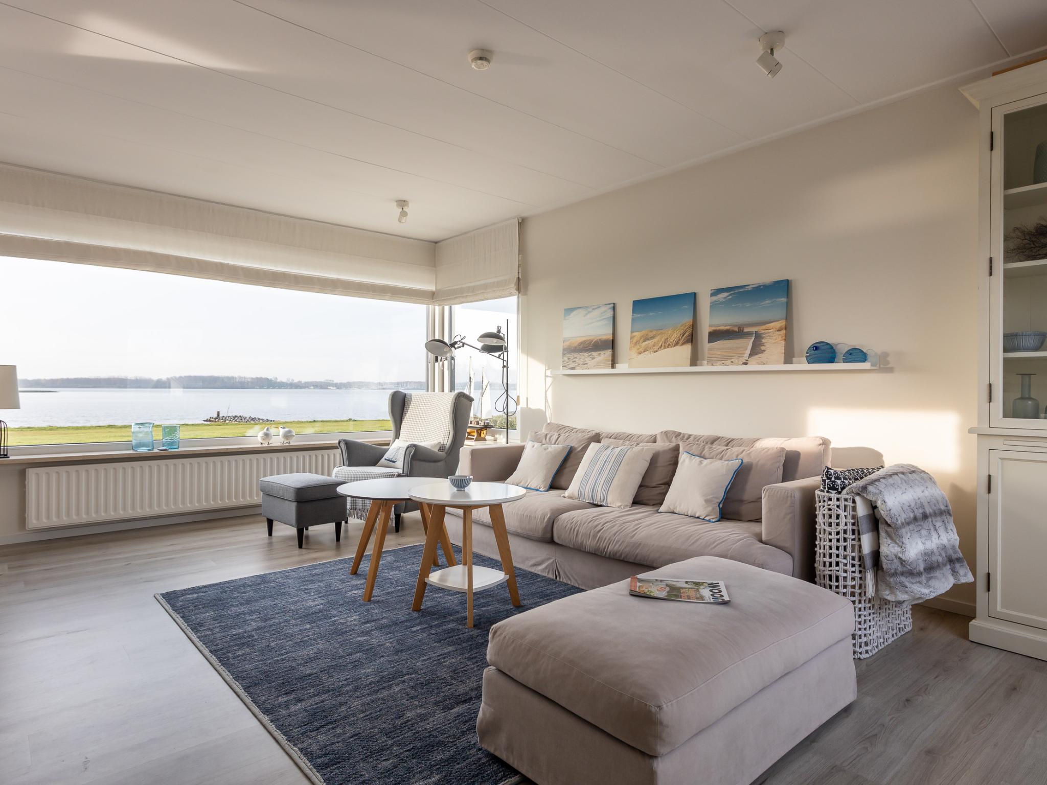 Swimming pool area at Veerse Meer Natuurvilla in Kamperland