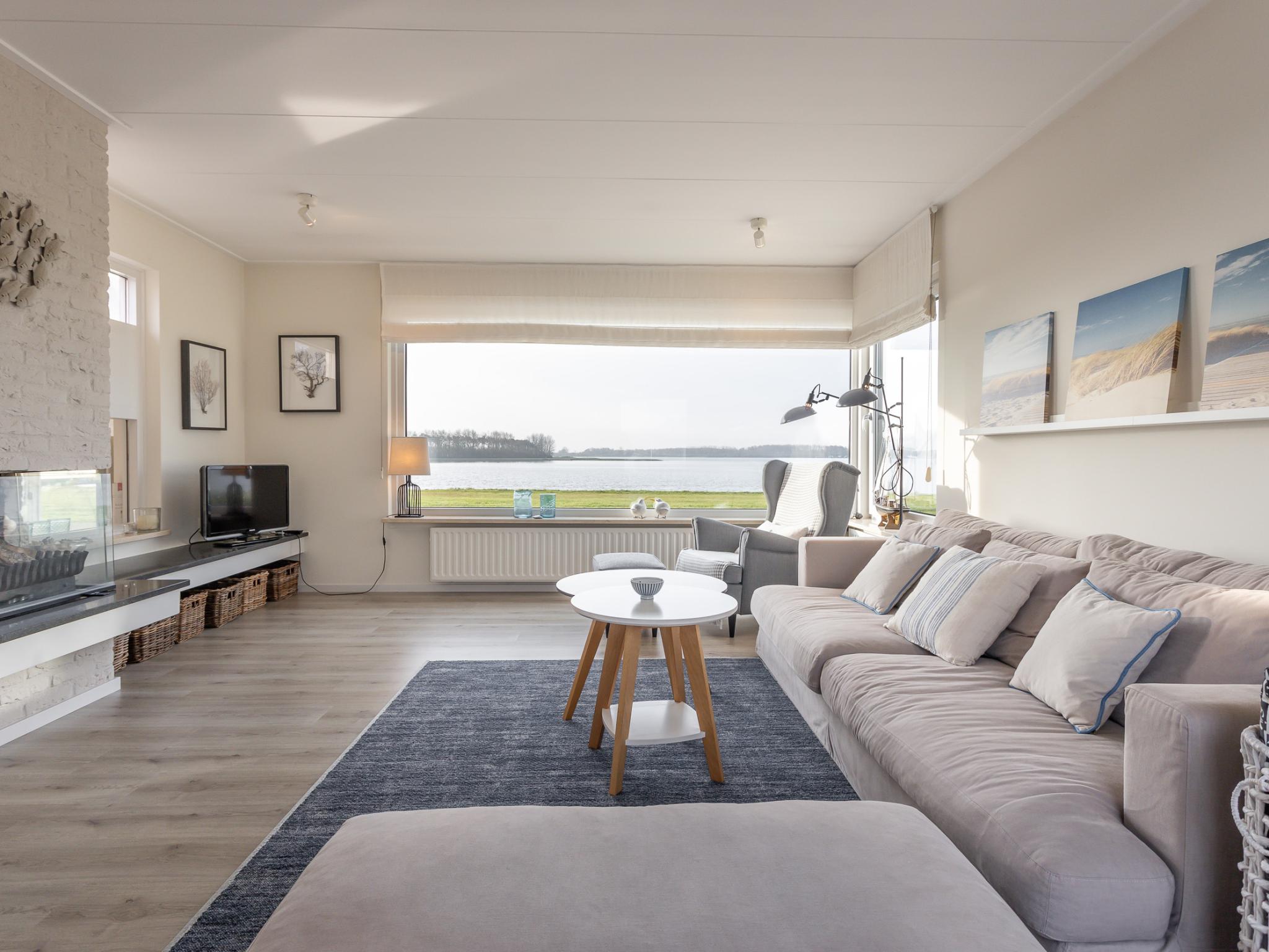 Bedroom with comfortable beds at Veerse Meer Natuurvilla in Kamperland