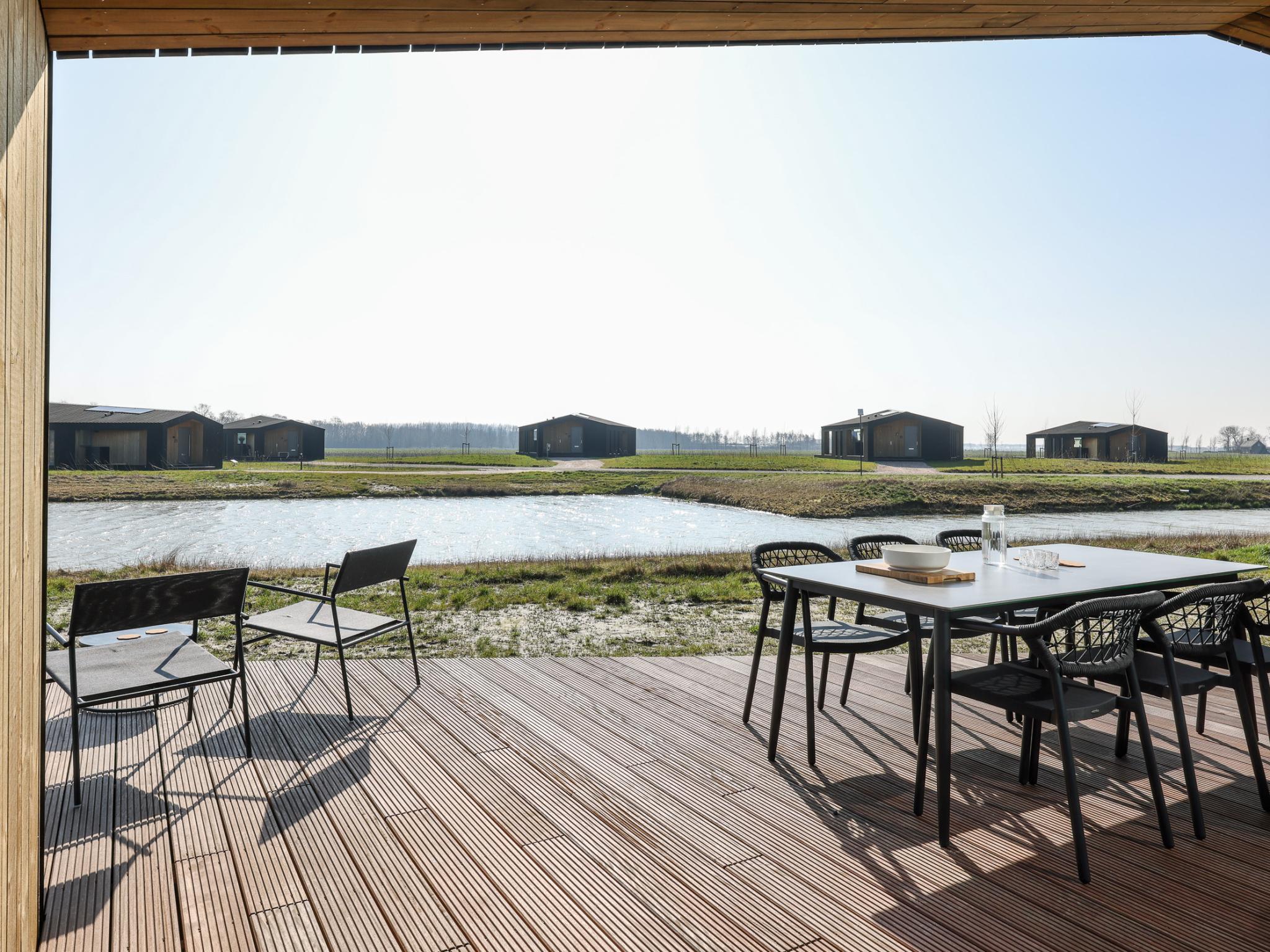 Outdoor terrace and views at Natuurhuis Trekzicht in Wissenkerke