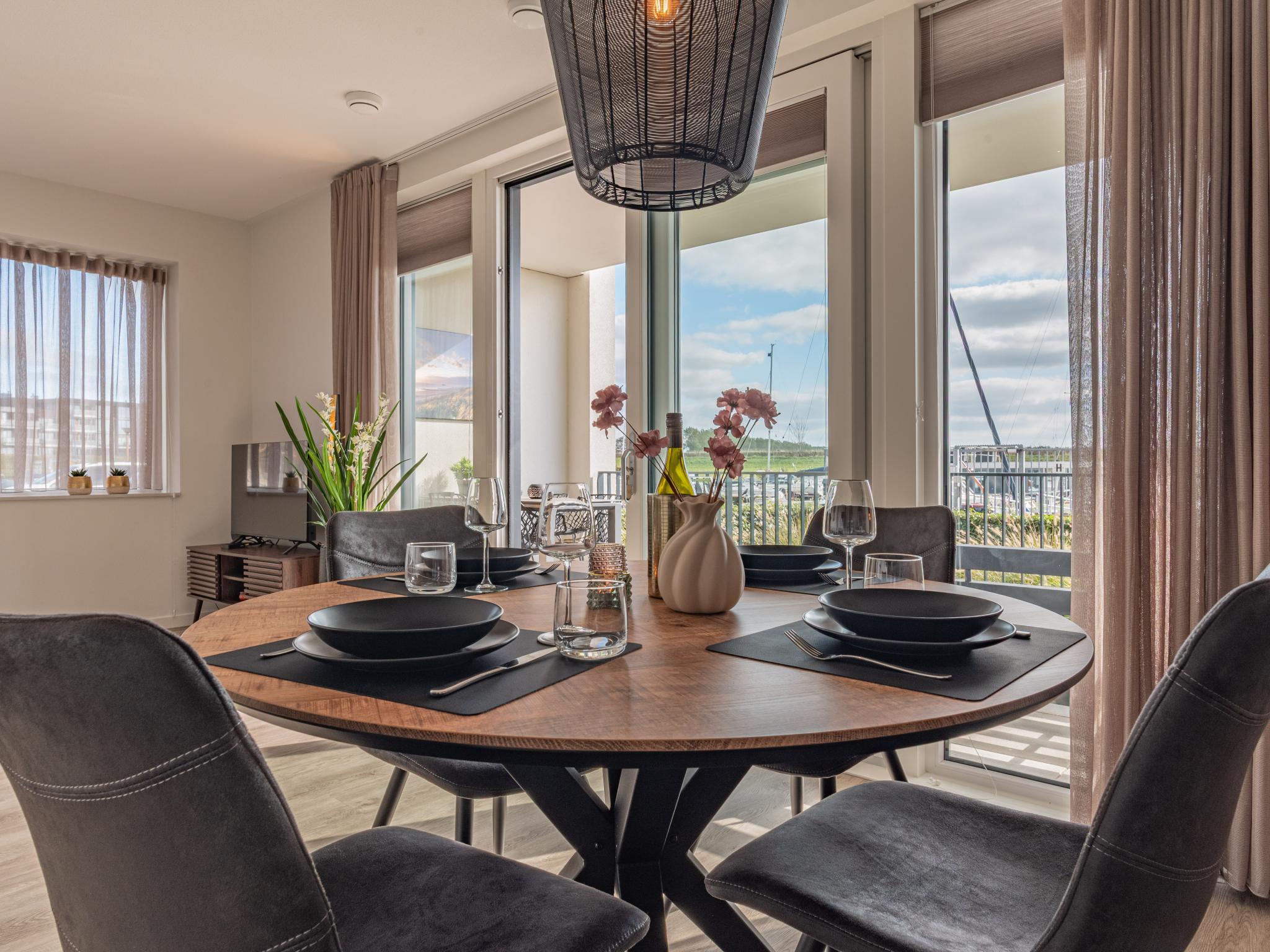 Swimming pool area at Het Havenverblijf in Kamperland