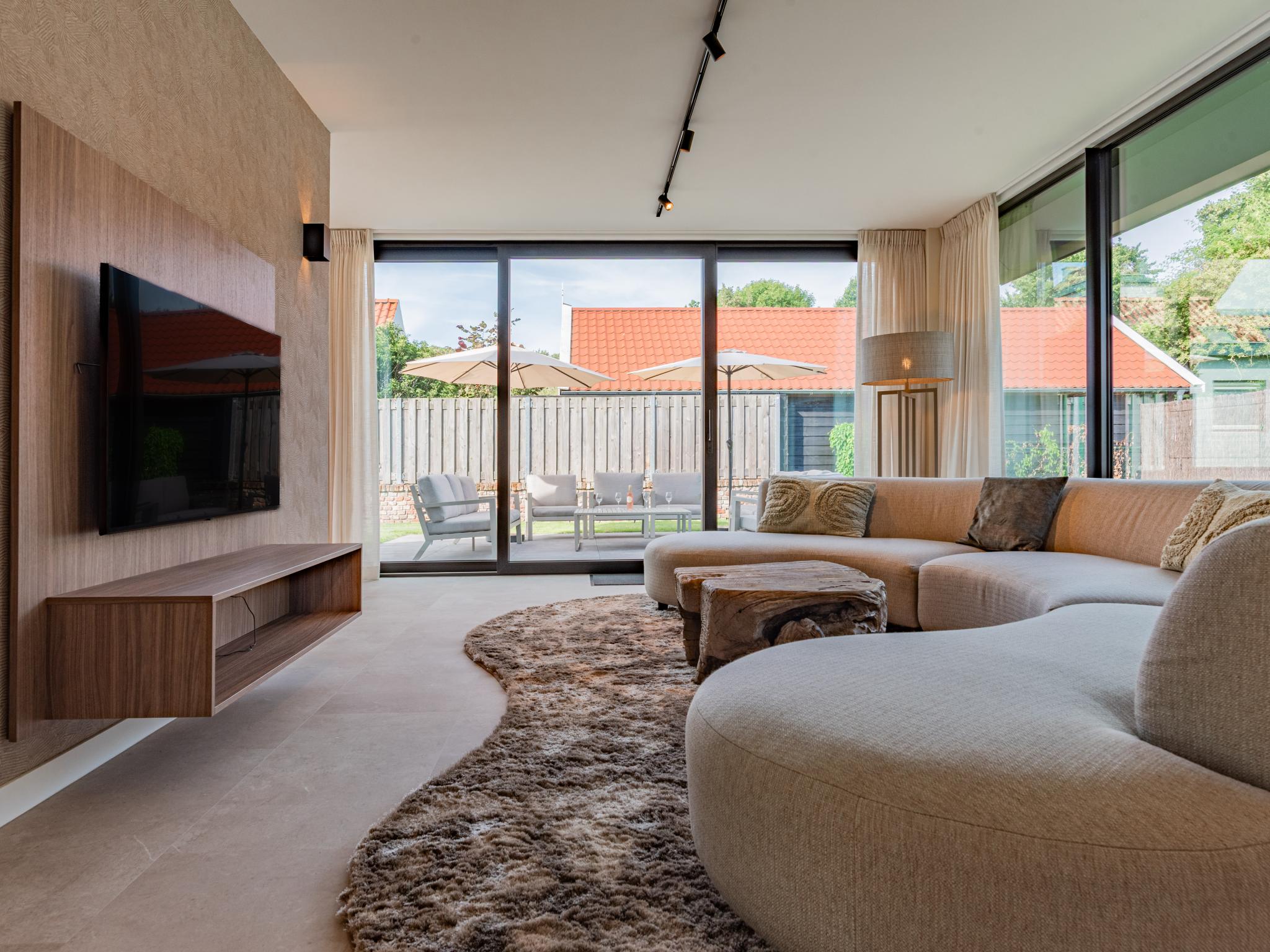 Bedroom with comfortable beds at Villa Zilte Duinen in Groot Valkenisse