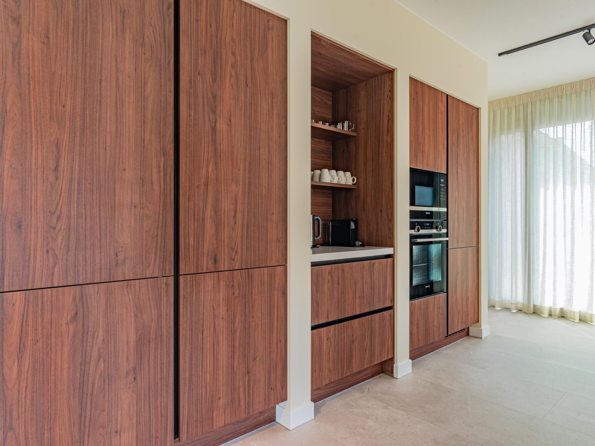 Swimming pool area at Villa Zilte Duinen in Groot Valkenisse