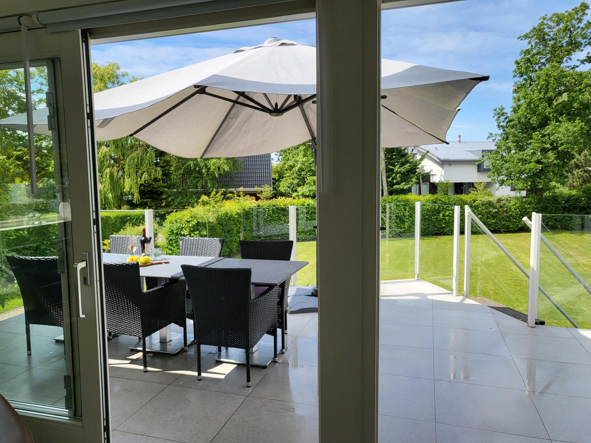 Outdoor terrace and views at Meerzicht Schotsman in Kamperland
