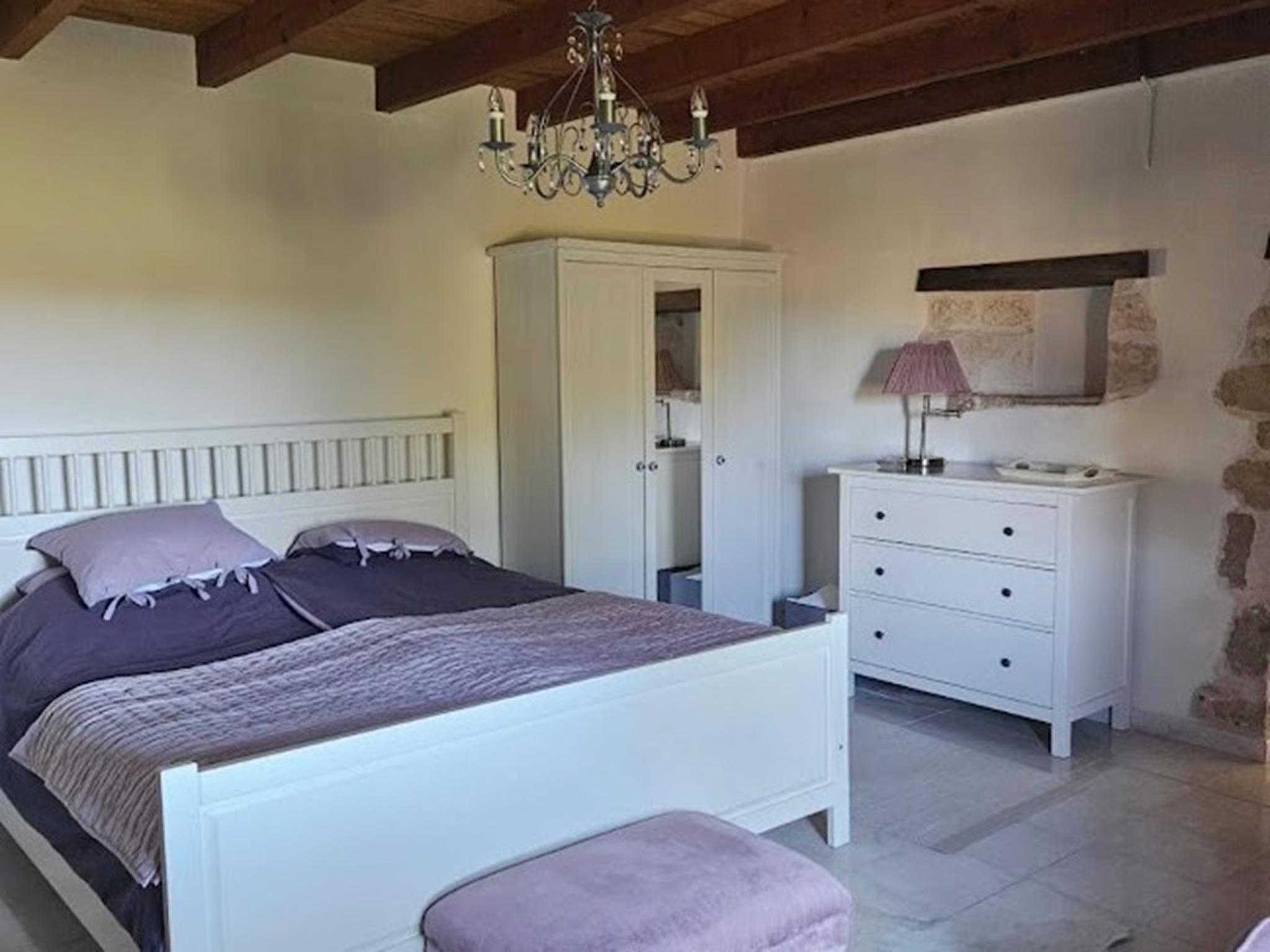 Bedroom with comfortable beds at Le Bonheur in La Villedieu