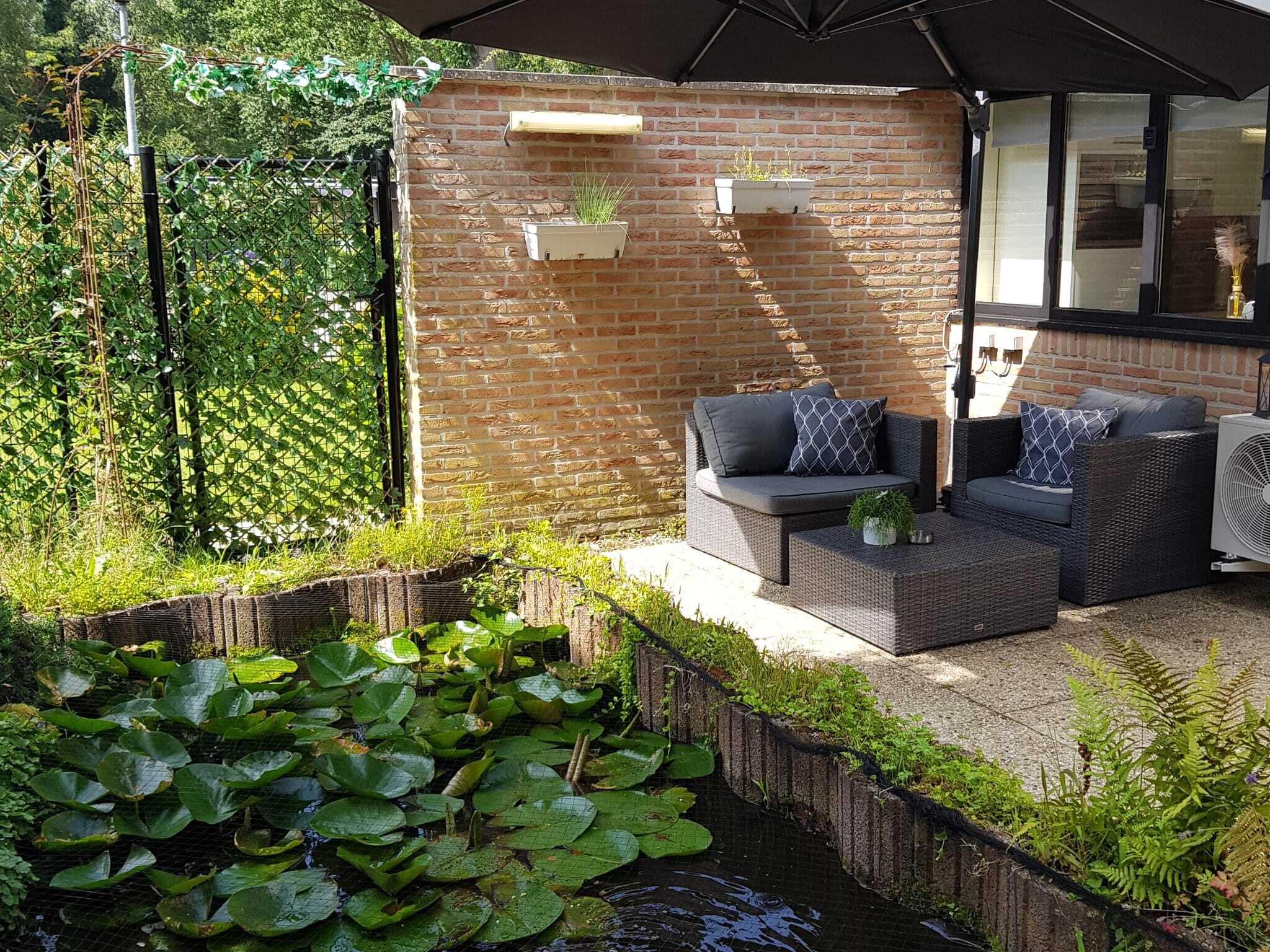 Bedroom with comfortable beds at Bungalow Sonnerust in Lanaken