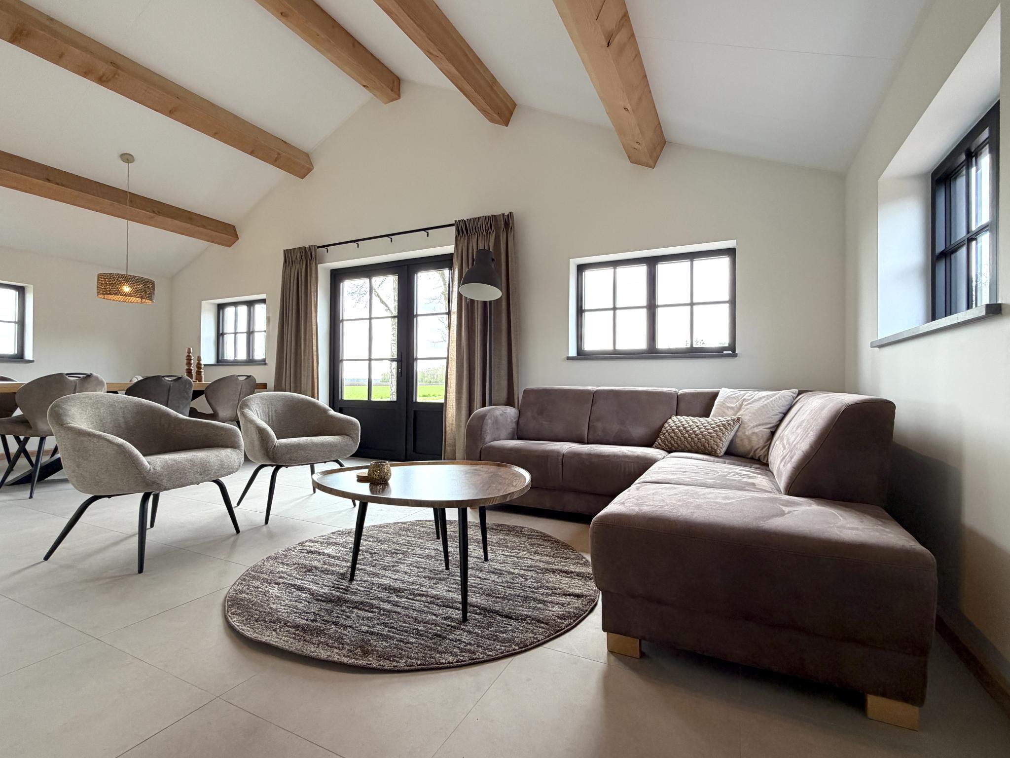 Living area at Guesthouse het Koetshuis in Bladel