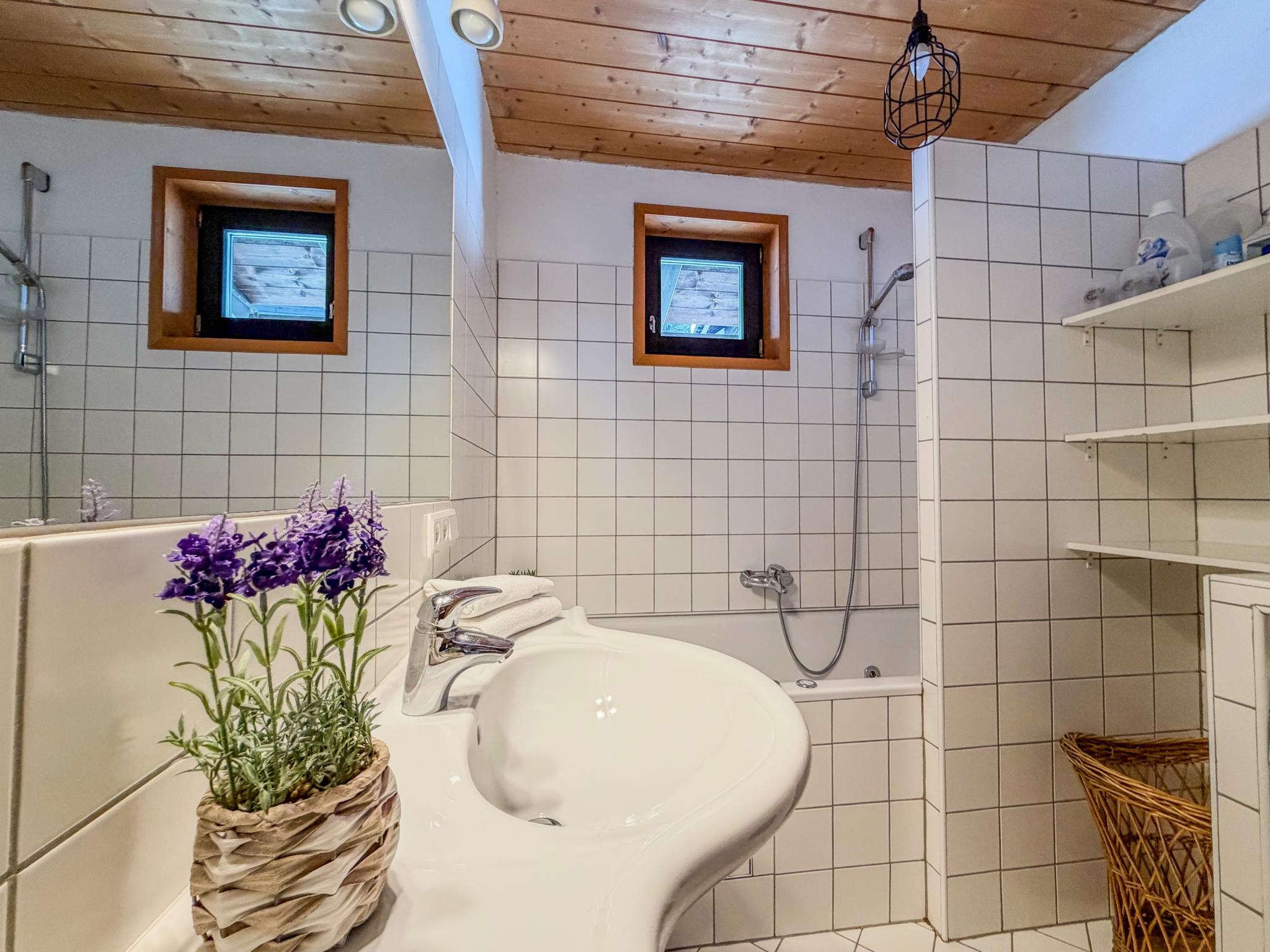 Bedroom with comfortable beds at Salburg Sonnleitn in Sonnleitn Nassfeld