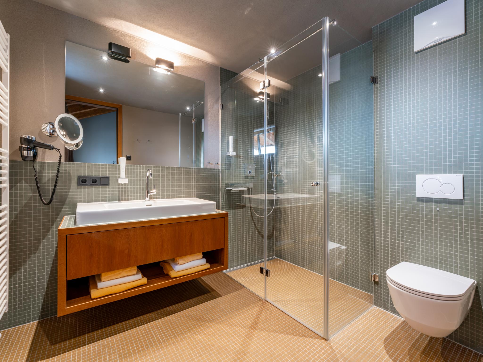 Modern kitchen at Tauern Suites Mitterwirt Kombi Penthouse in Piesendorf