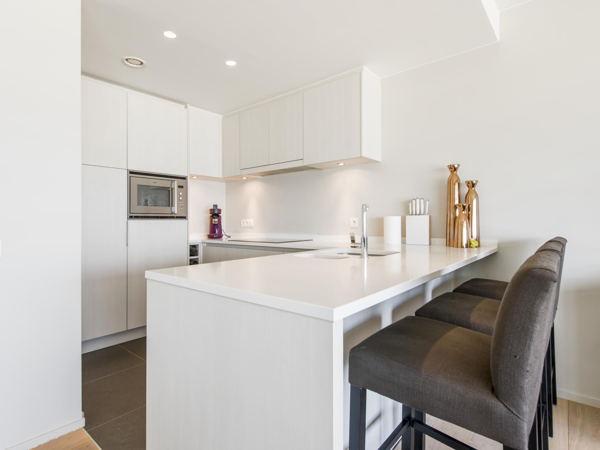 Bedroom with comfortable beds at Eden - B7 + garage 2.16 in Blankenberge