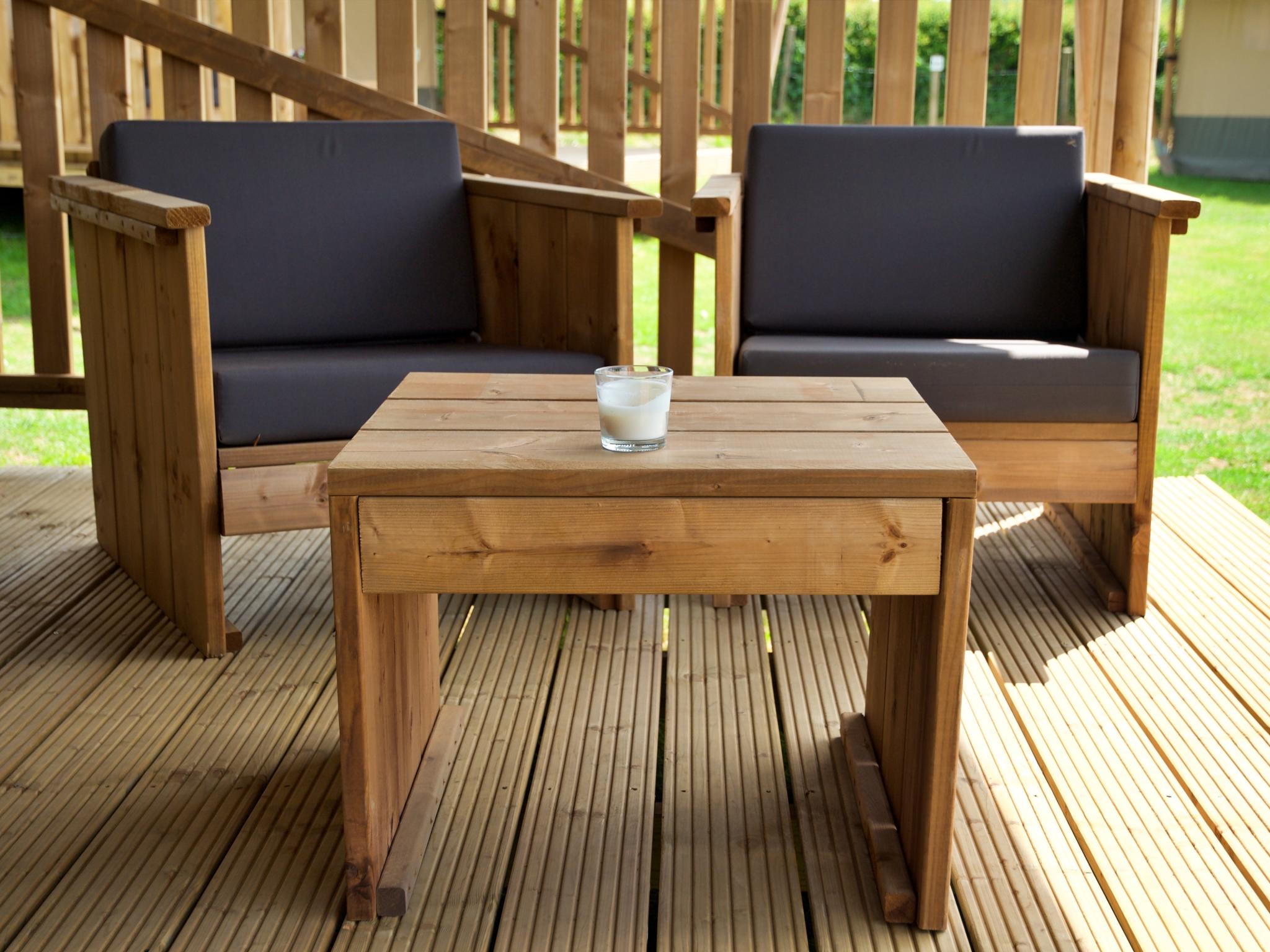 Swimming pool area at Safarilodge l 4 pers in Zorgvlied