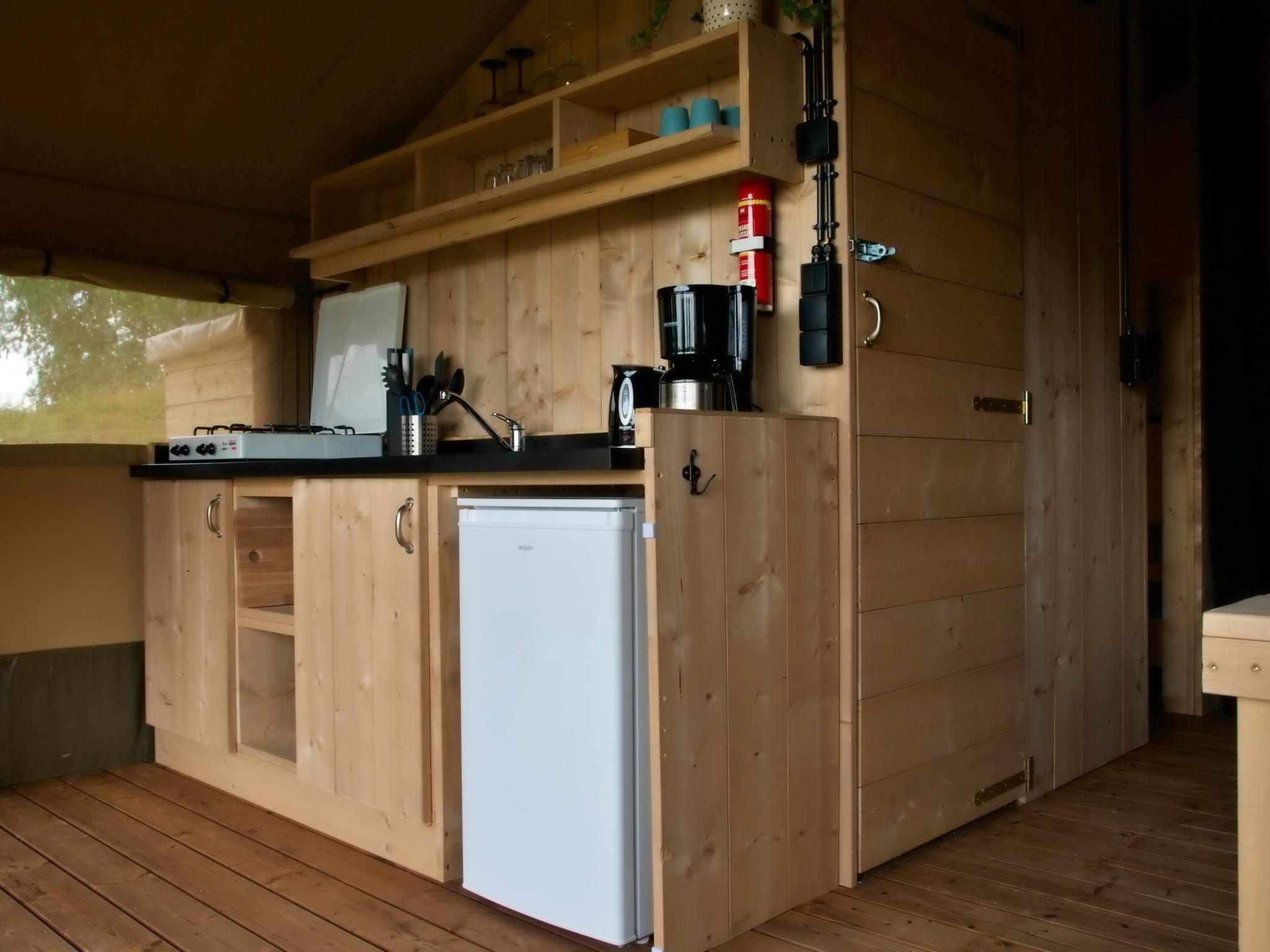 Bedroom with comfortable beds at Safarilodge l 4 pers in Zorgvlied