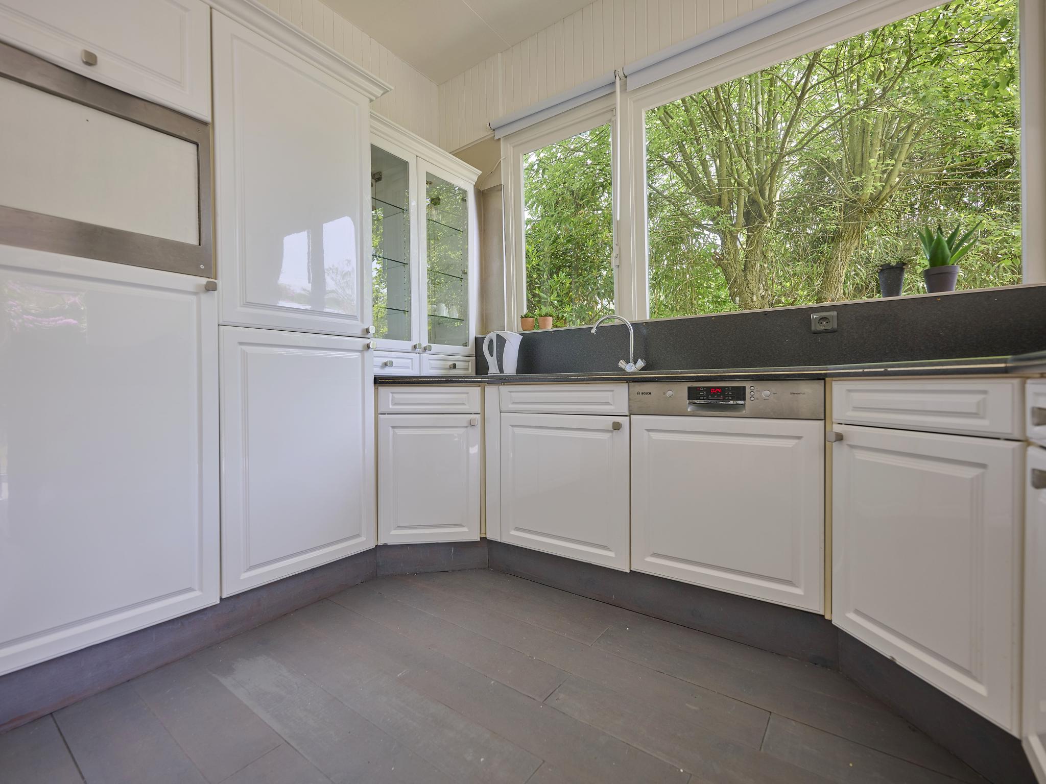 Modern kitchen at Brabants licht in Lage Mierde