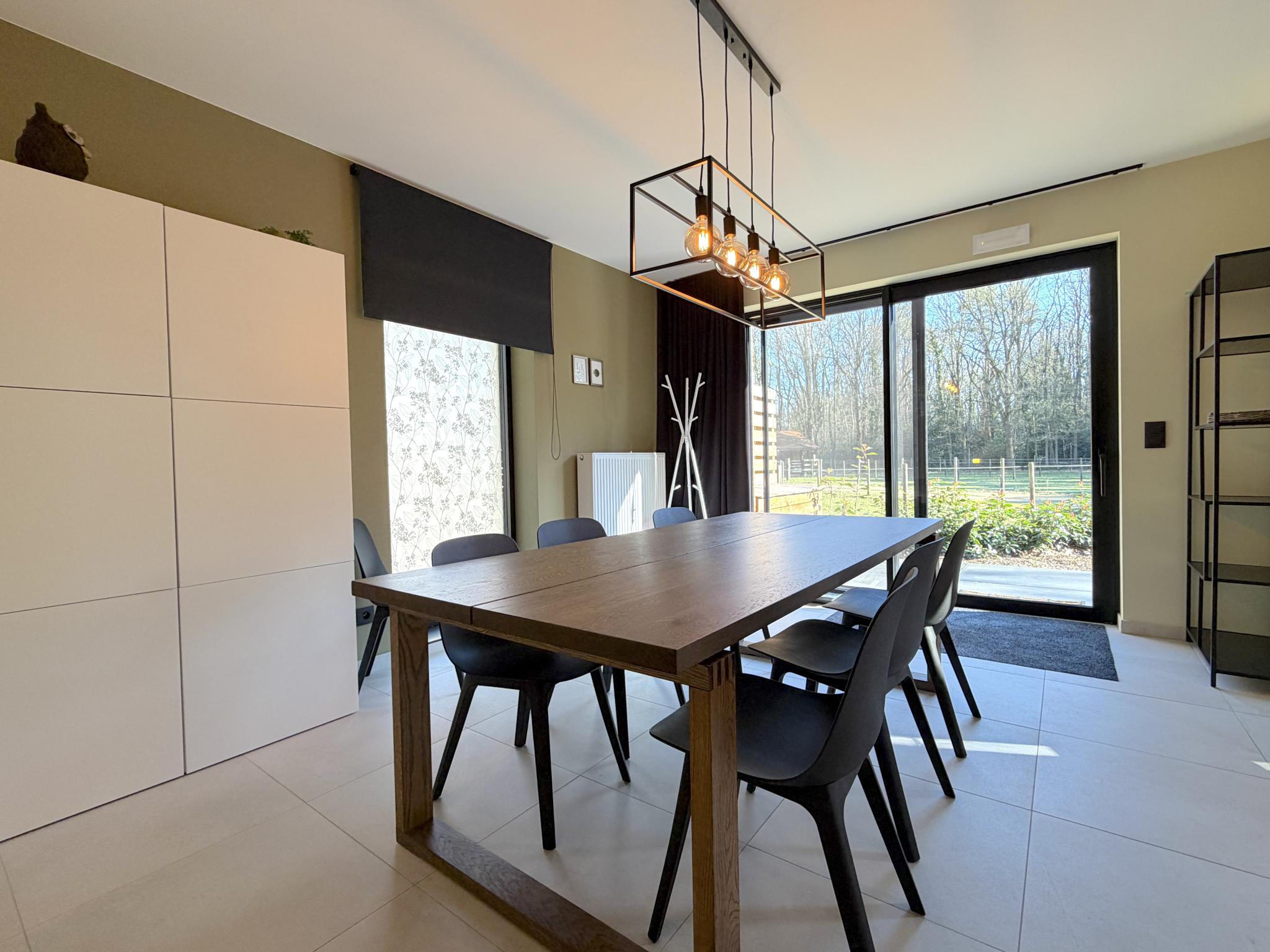 Bedroom with comfortable beds at Huus 16 in Zutendaal