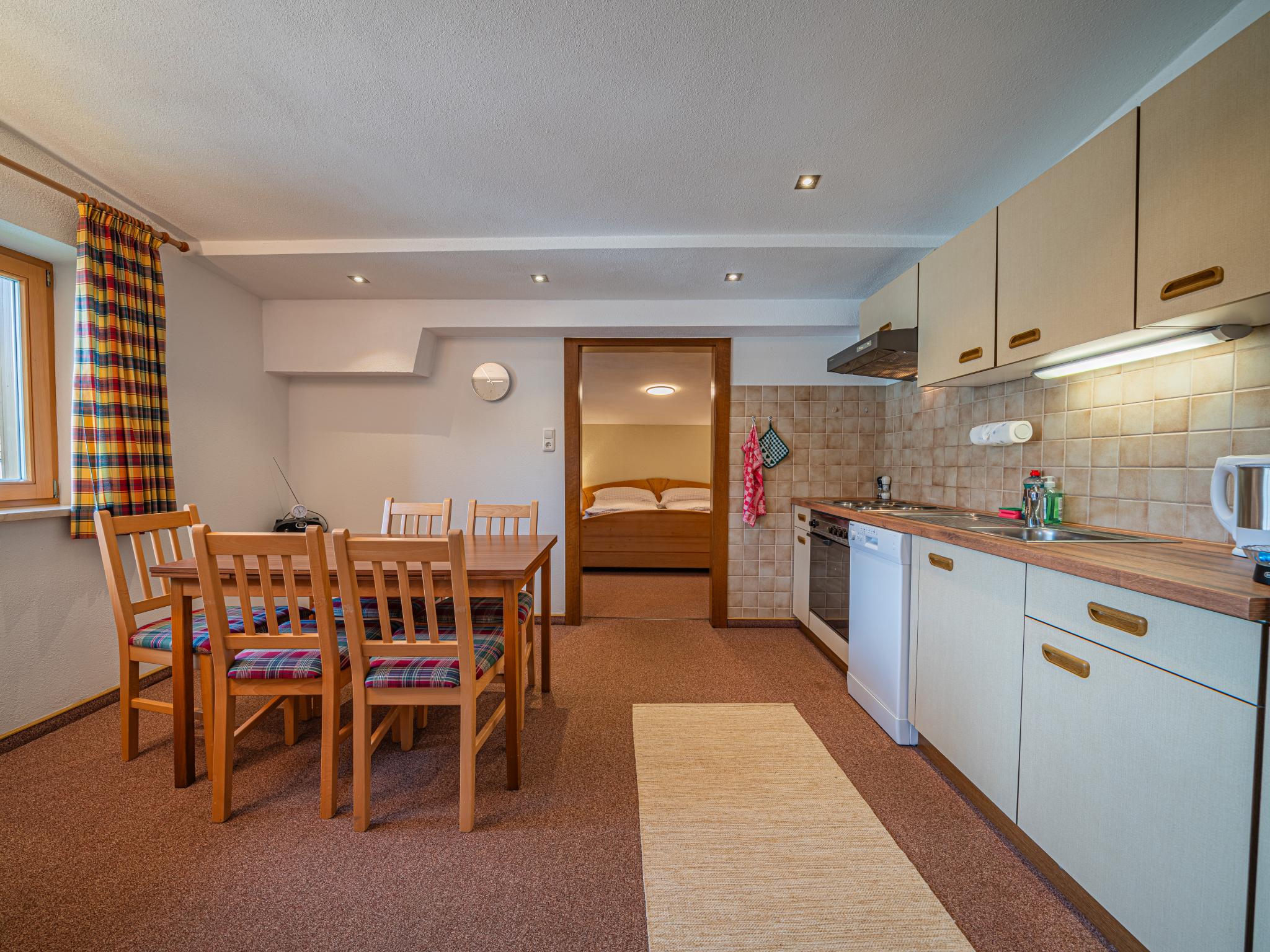 Bedroom with comfortable beds at Das Bergnest Bergluft in Söll