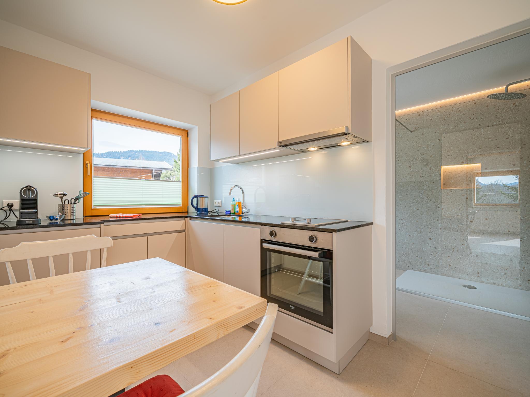 Bedroom with comfortable beds at Das Bergnest Heimatblick in Söll