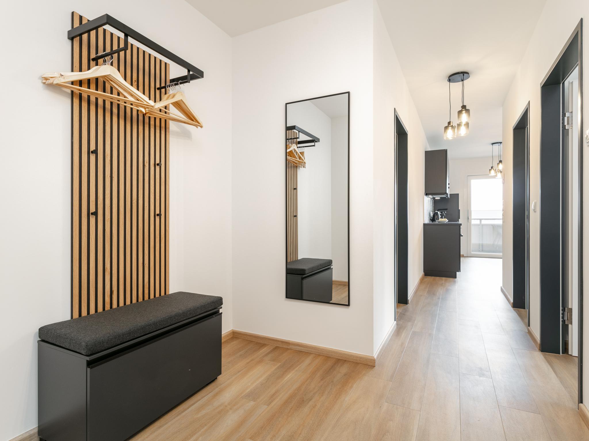 Swimming pool area at City Apartments Jenbach Top 2 in Jenbach