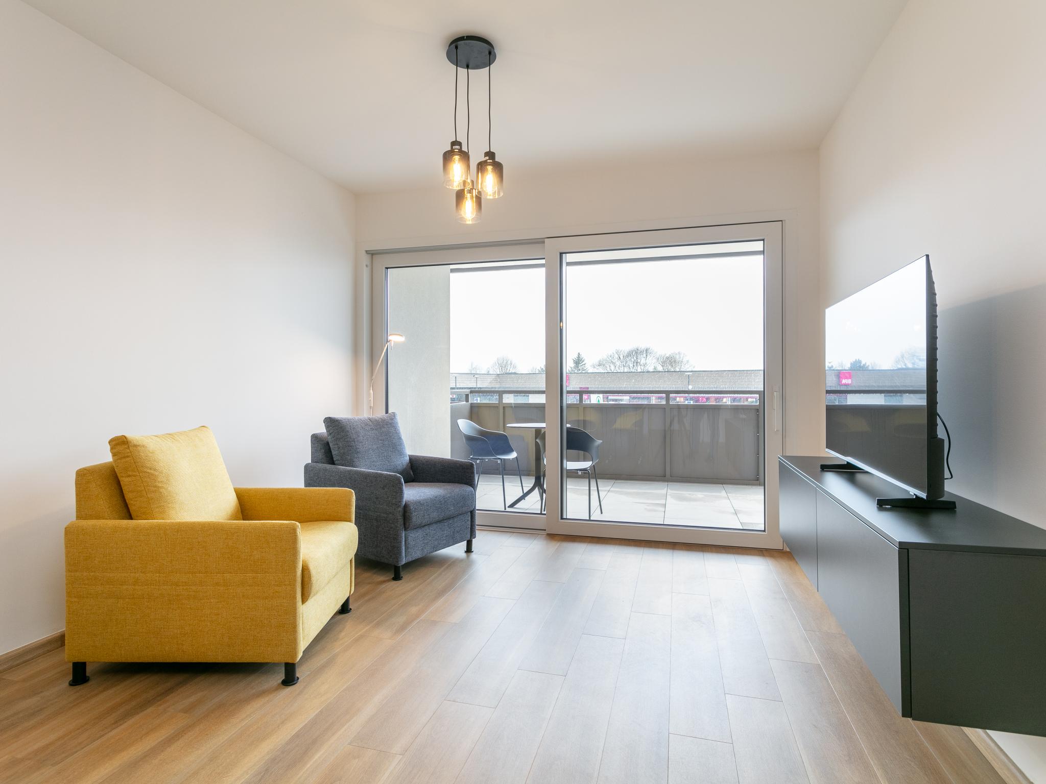 Bedroom with comfortable beds at City Apartments Jenbach Top 3 in Jenbach