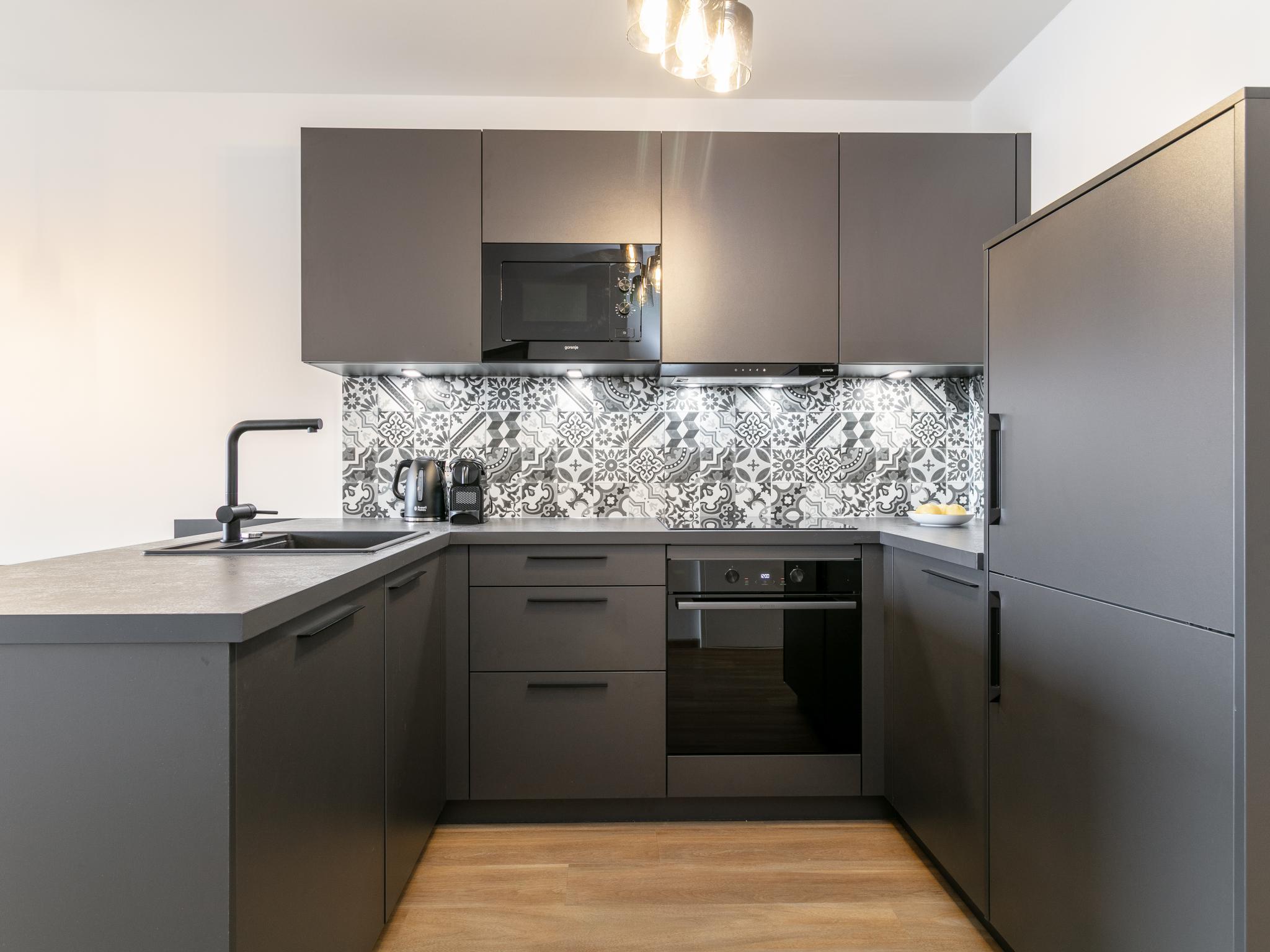 Bedroom with comfortable beds at City Apartments Jenbach Top 4 in Jenbach