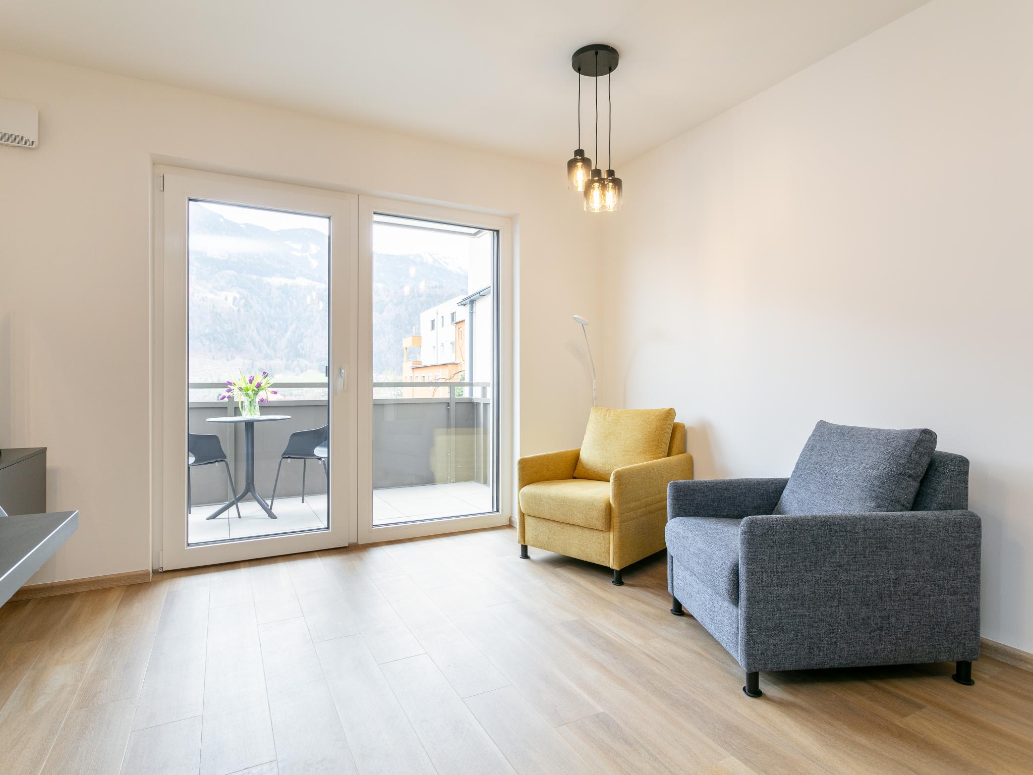 Swimming pool area at City Apartments Jenbach Top 7 in Jenbach