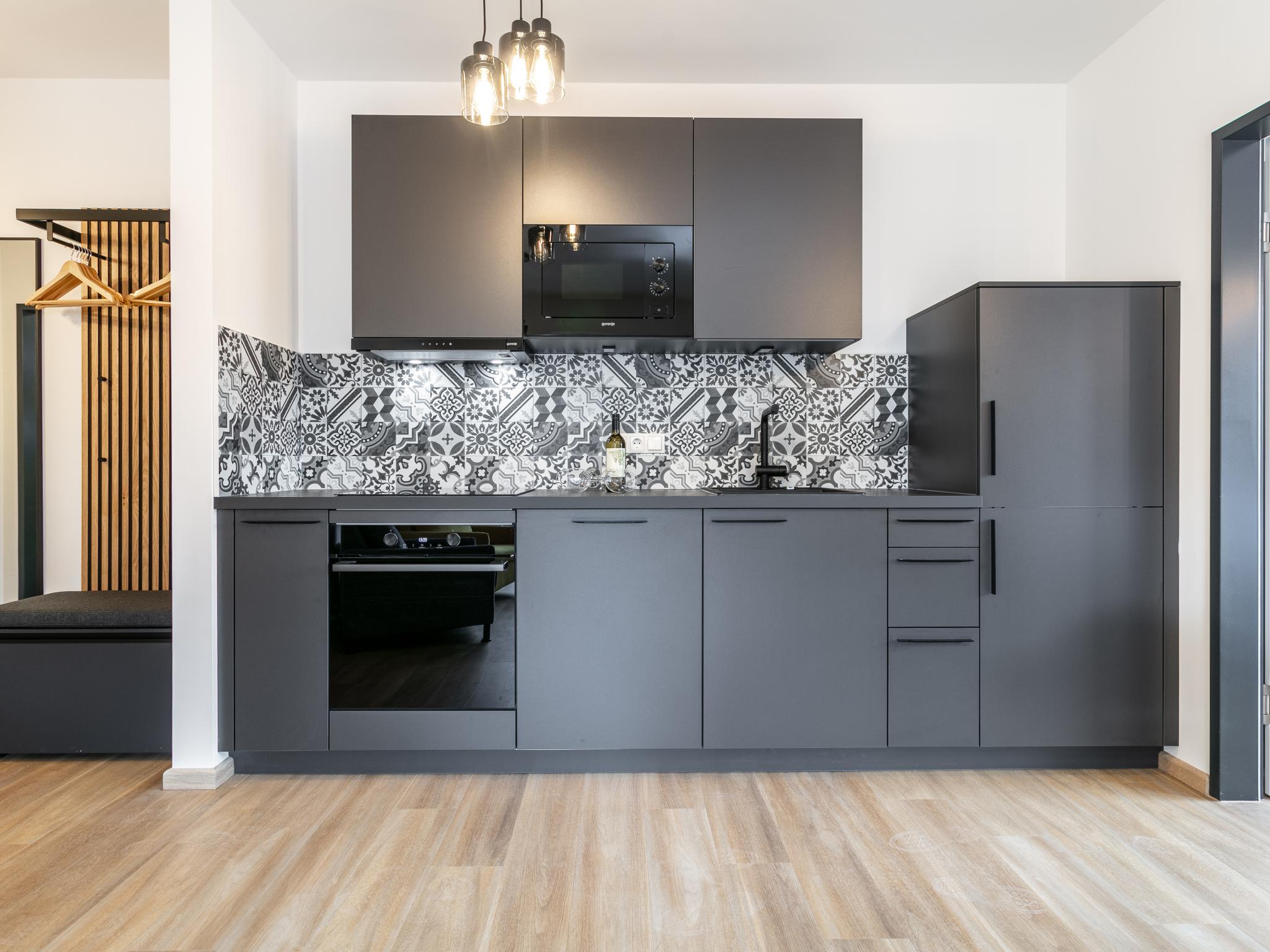 Bedroom with comfortable beds at City Apartments Jenbach Top 7 in Jenbach