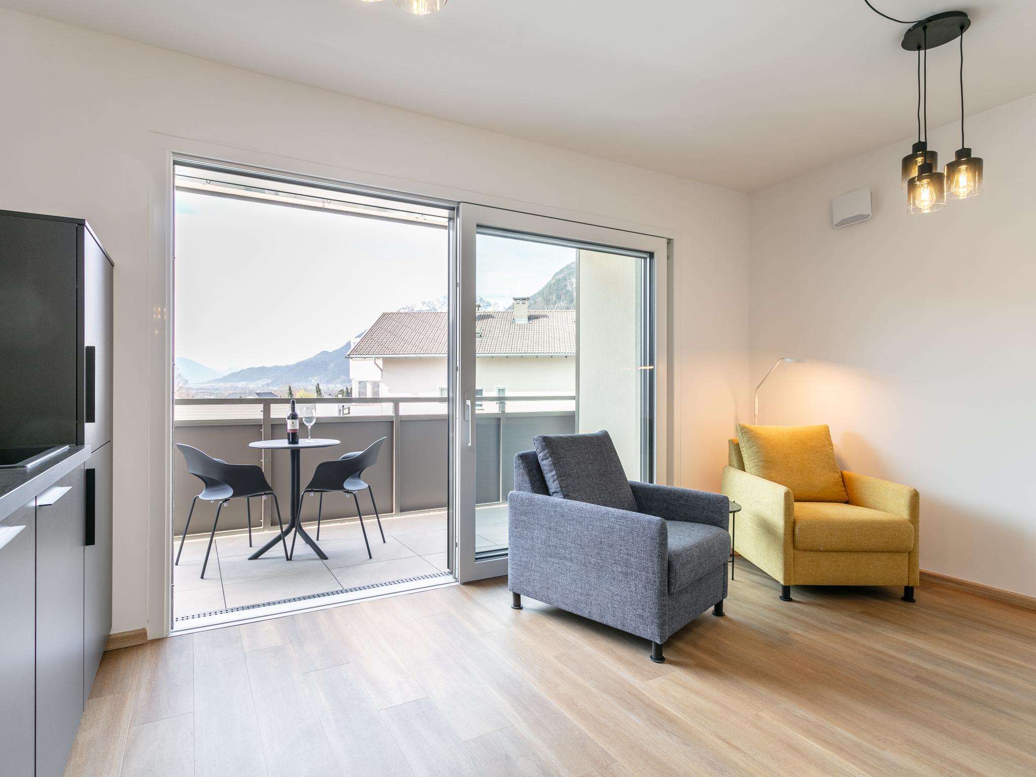 Swimming pool area at City Apartments Jenbach Top 8 in Jenbach