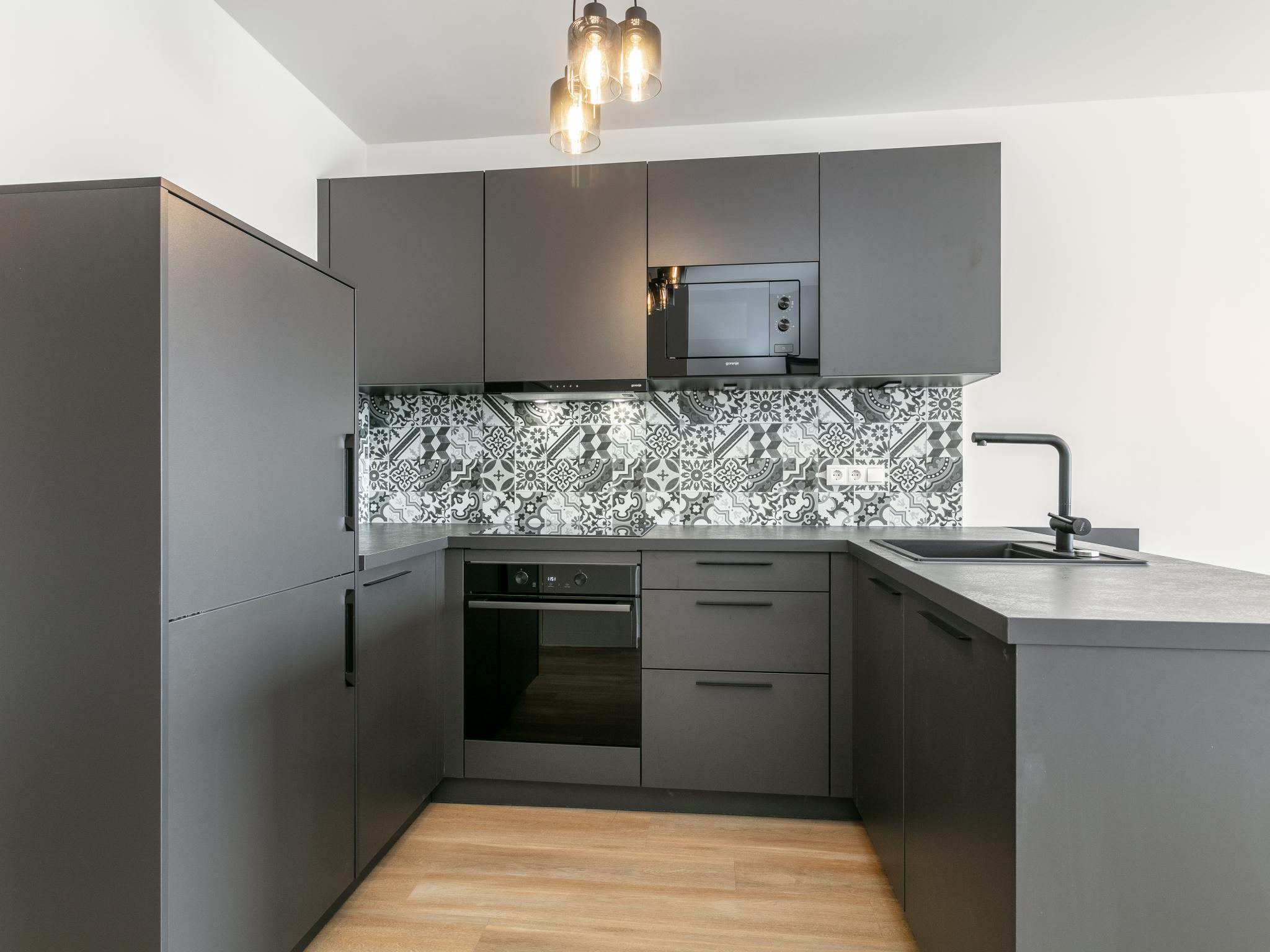 Bedroom with comfortable beds at City Apartments Jenbach Top 9 in Jenbach