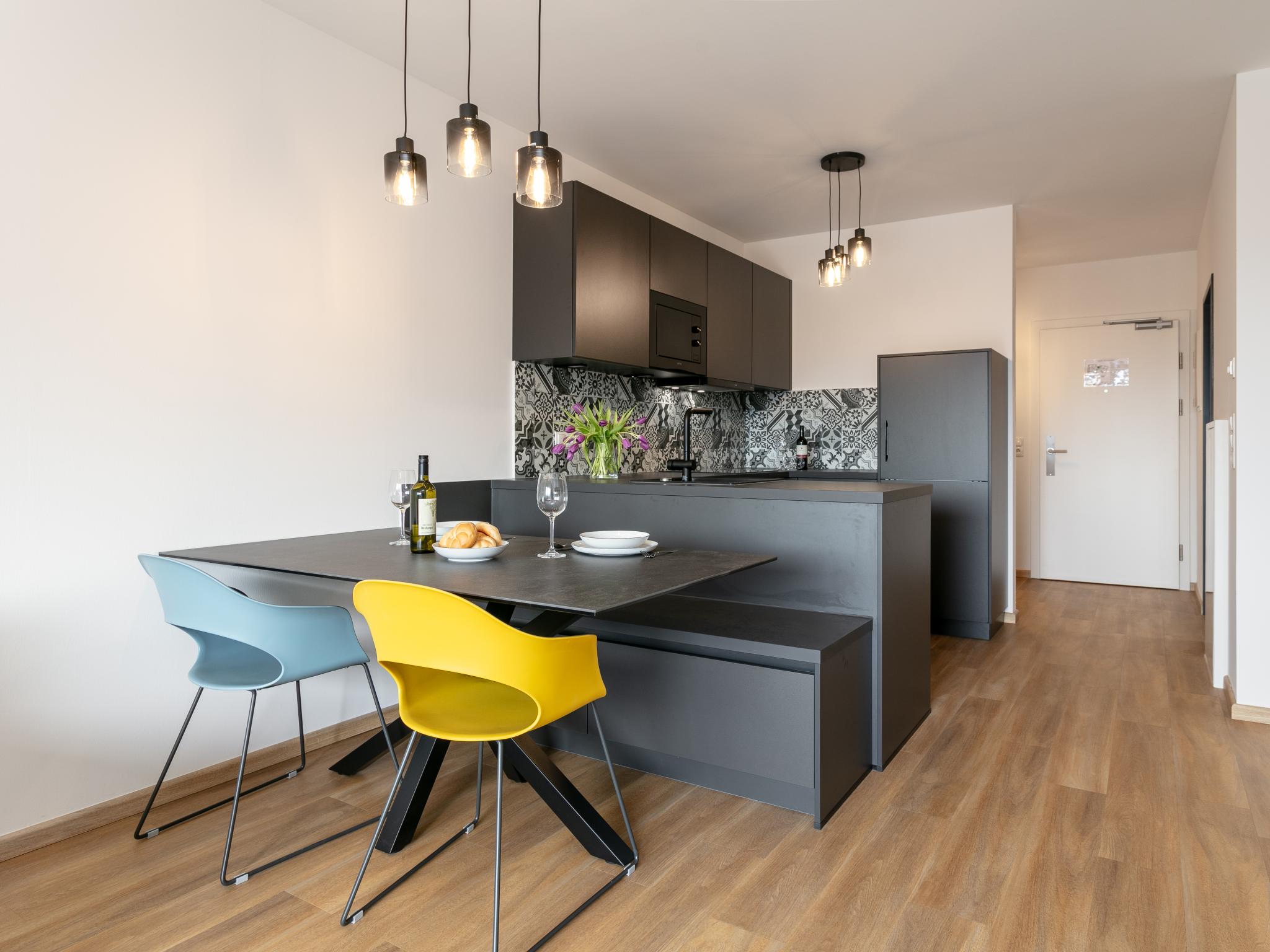 Bedroom with comfortable beds at City Apartments Jenbach Top 10 in Jenbach