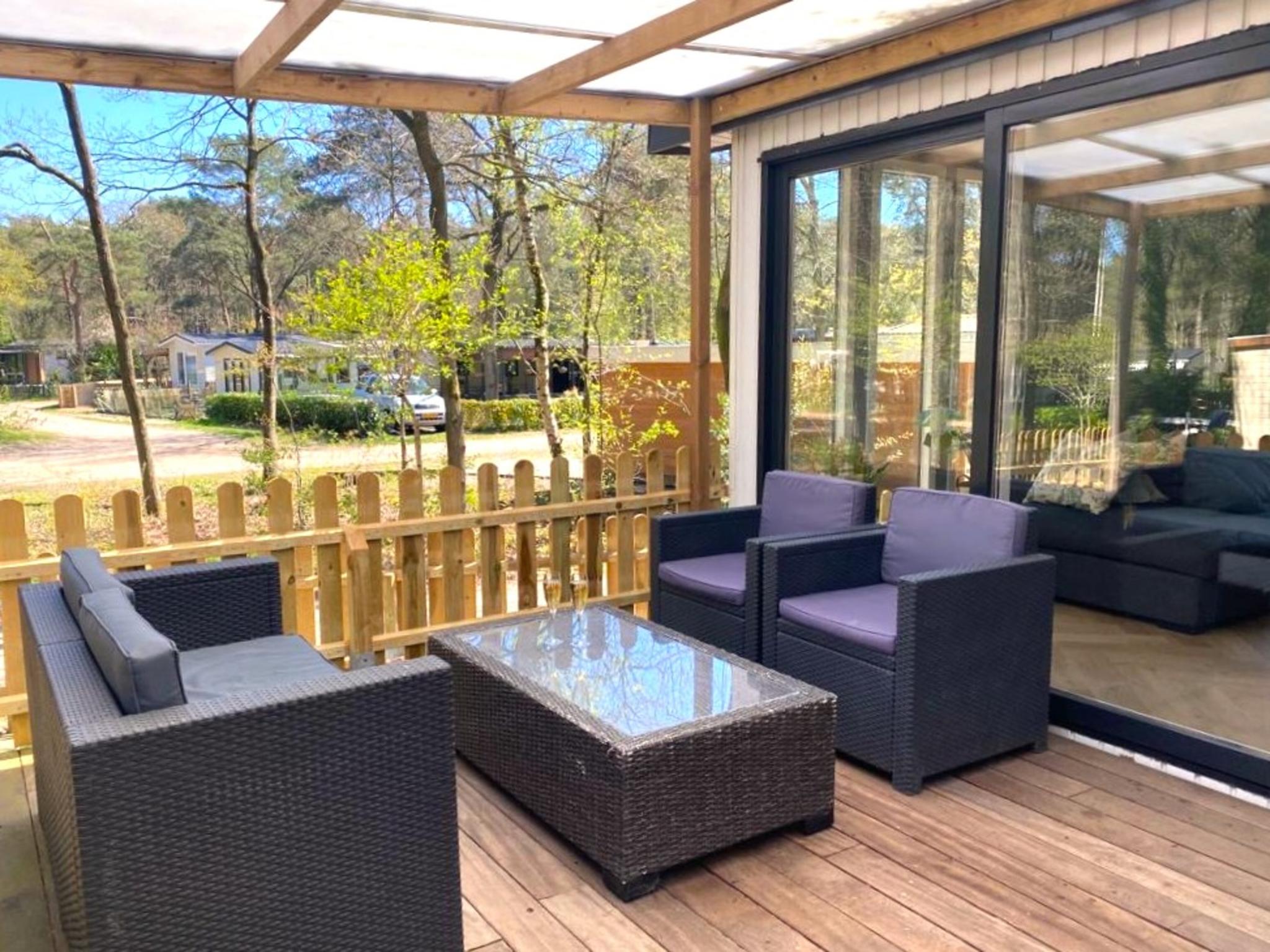 Swimming pool area at Villa Fox in IJhorst