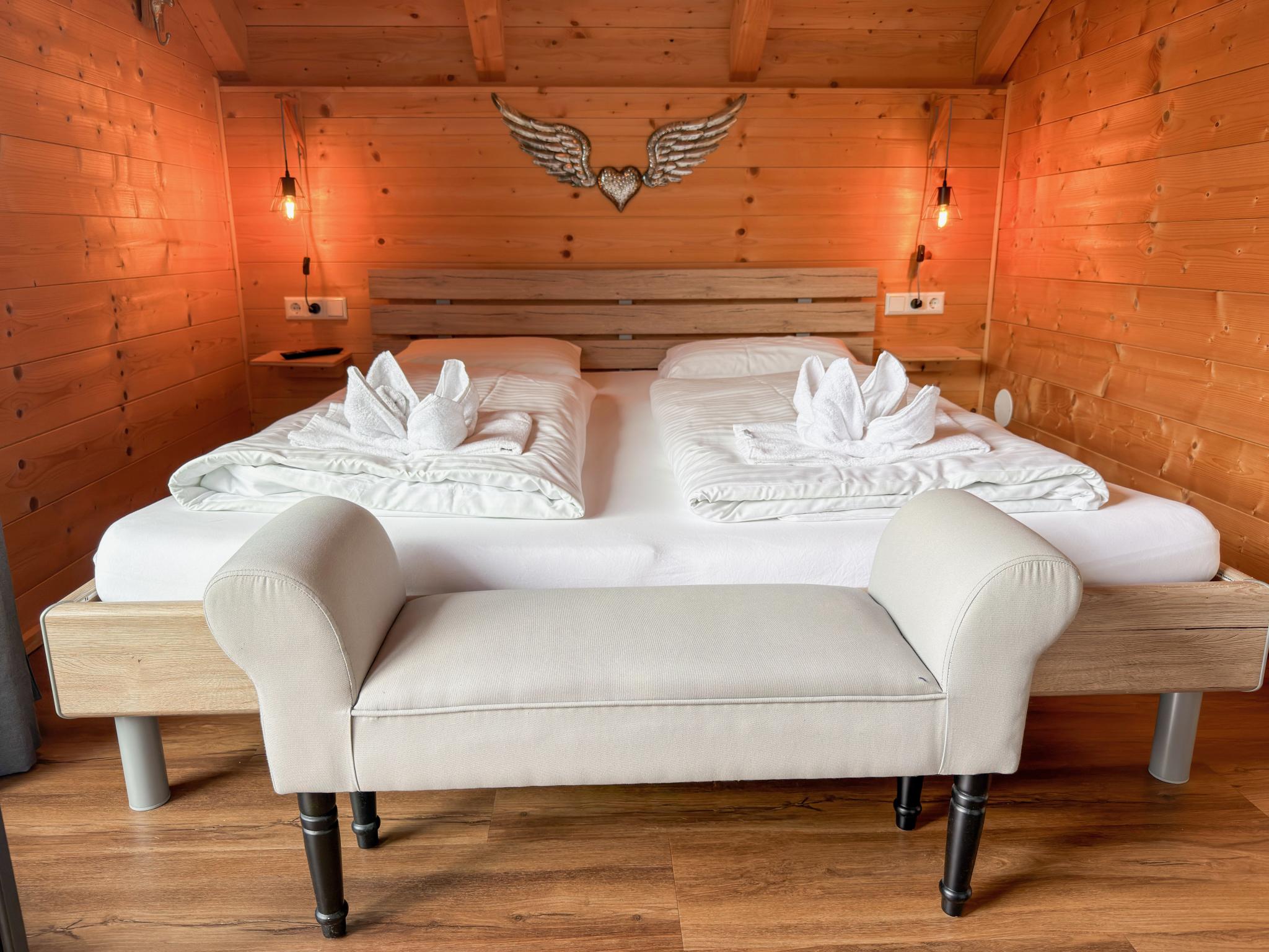 Bedroom with comfortable beds at Rattendorf 5B in Rattendorf
