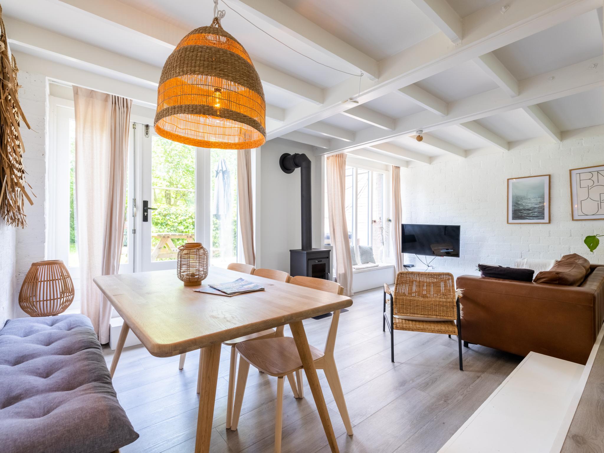 Bedroom with comfortable beds at De Nordic Escape in Warmenhuizen