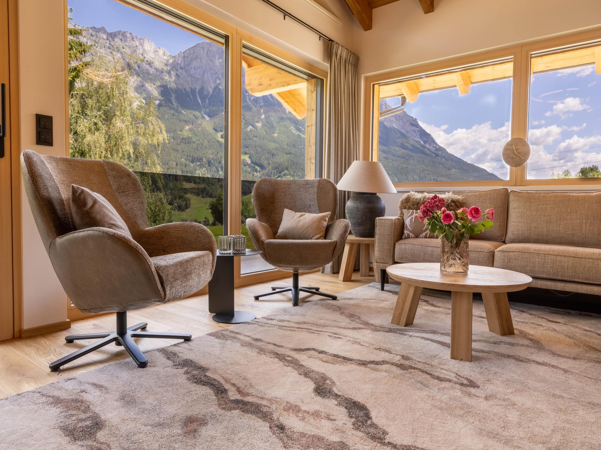 Bedroom with comfortable beds at Dachstein Grand Alpine Lodge in Mitterberg-Sankt Martin