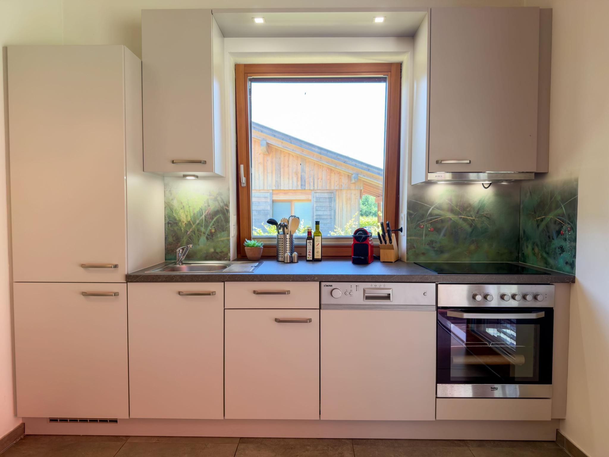Bedroom with comfortable beds at Oselitzen 56 in Hermagor-Pressegger See