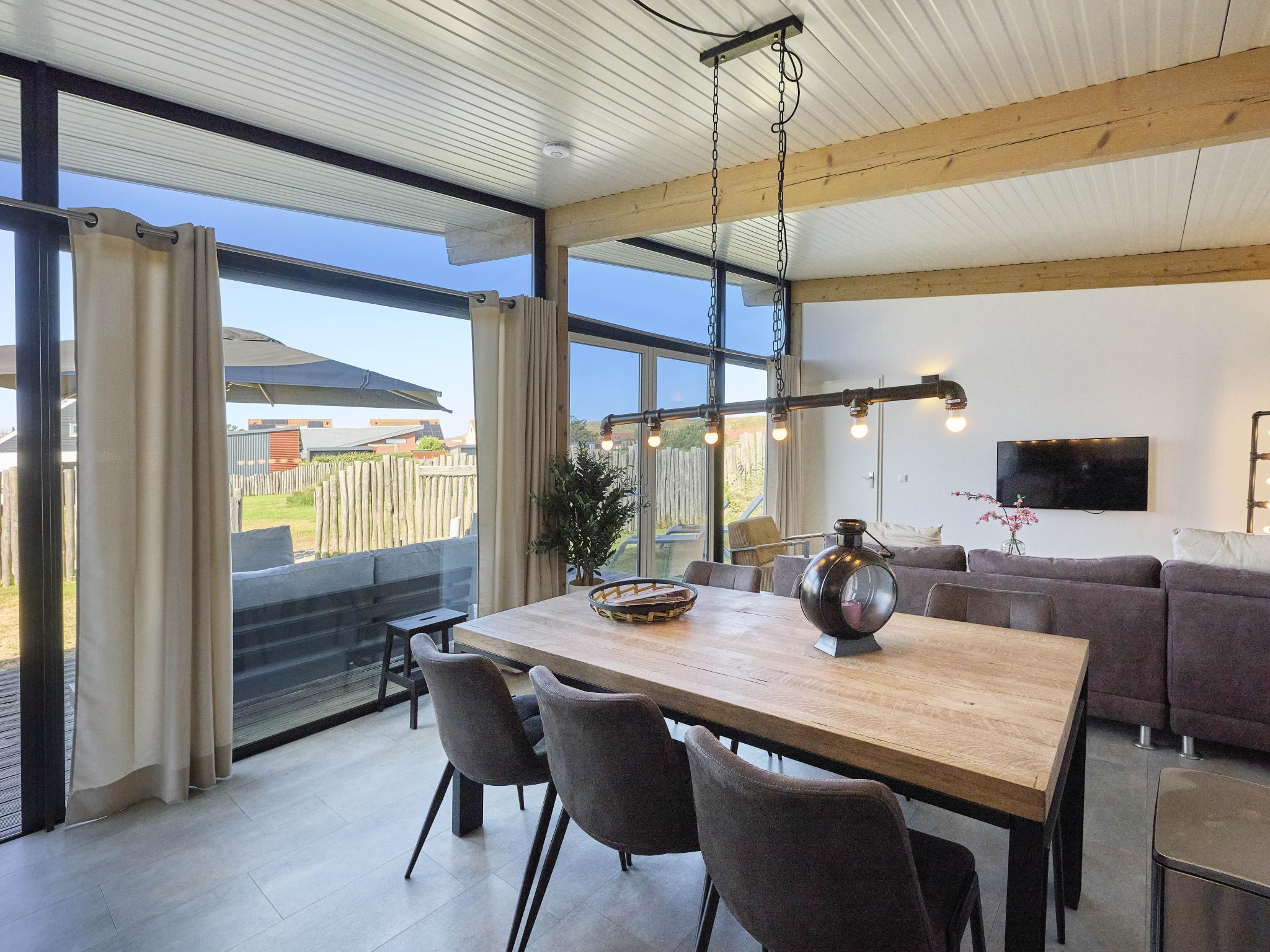 Bedroom with comfortable beds at Strandparel in Callantsoog