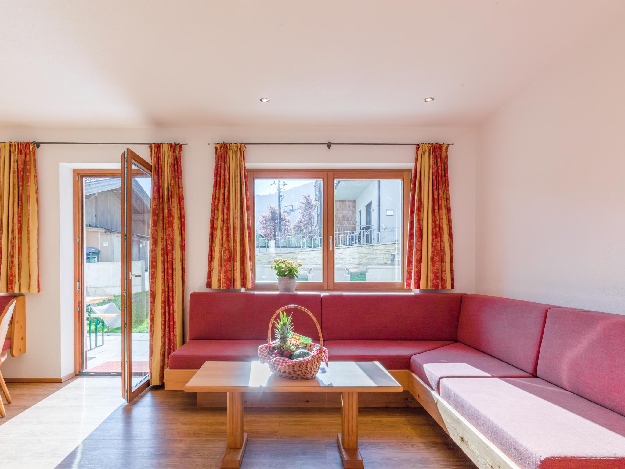 Bedroom with comfortable beds at An der Gondelstation A1 in Brixen im Thale
