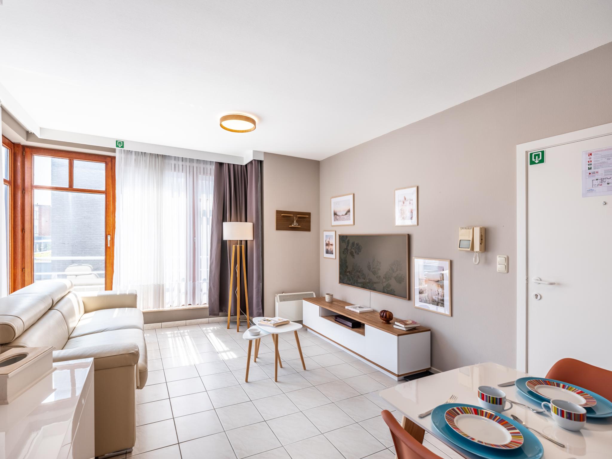 Bedroom with comfortable beds at Rouzé in Koksijde