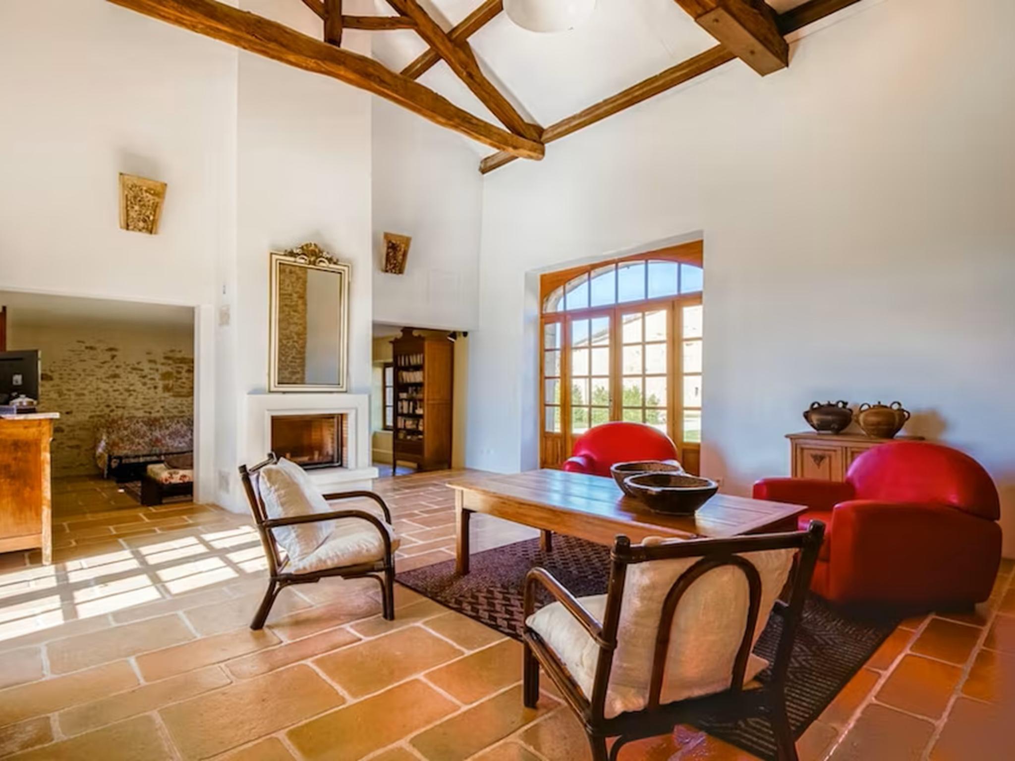 Outdoor terrace and views at Gite de Lapile in Sauveterre la Lemance