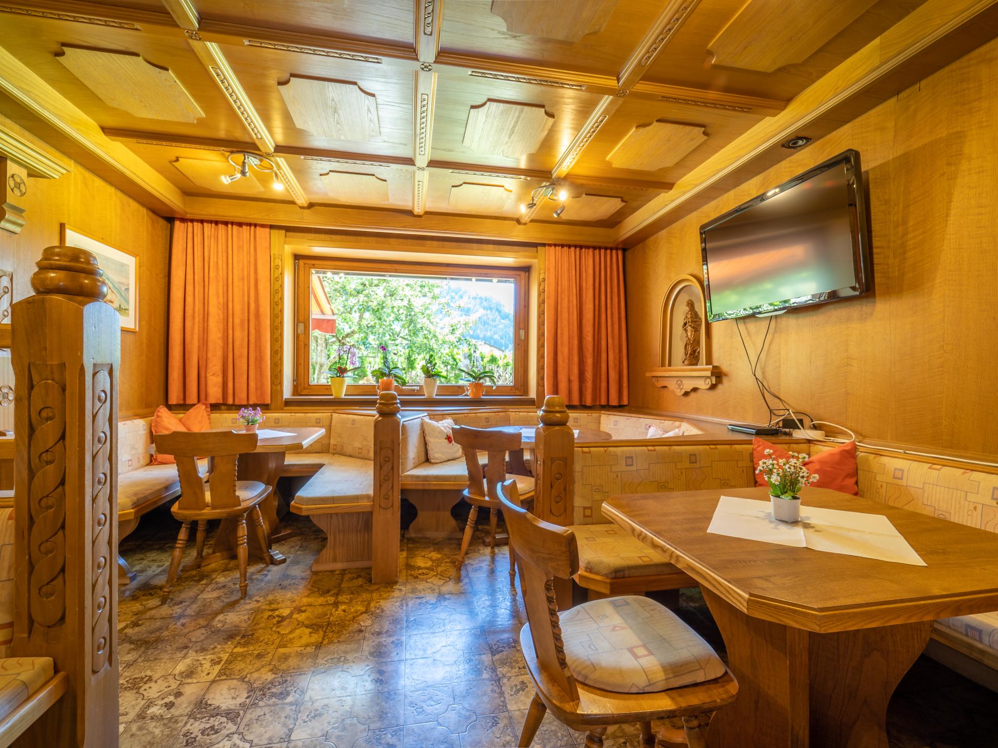 Bedroom with comfortable beds at Tiroler Gästehaus in Zell am Ziller